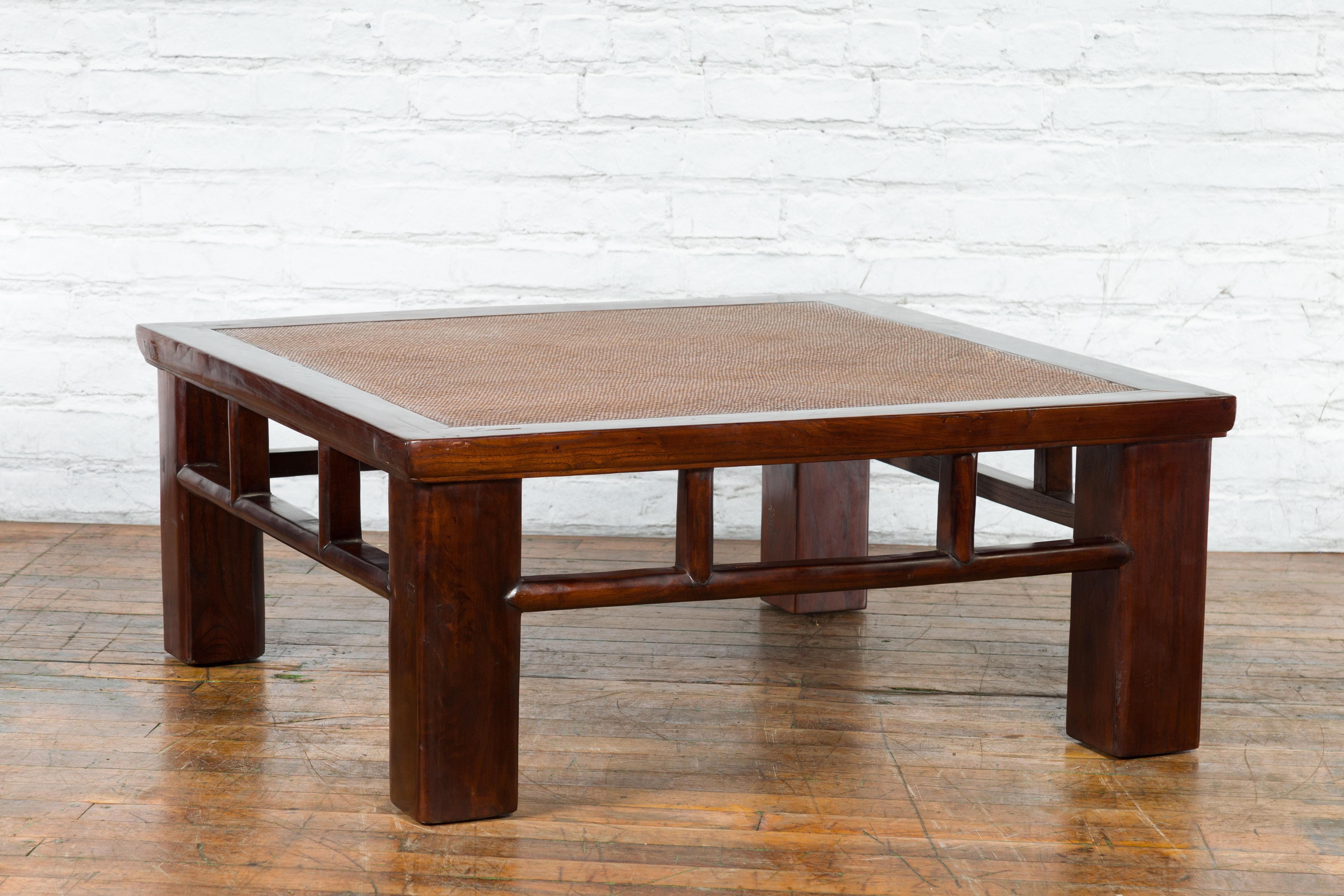 Chinese Early 20th Century Elmwood Coffee Table with Woven Rattan Top Inset For Sale 1