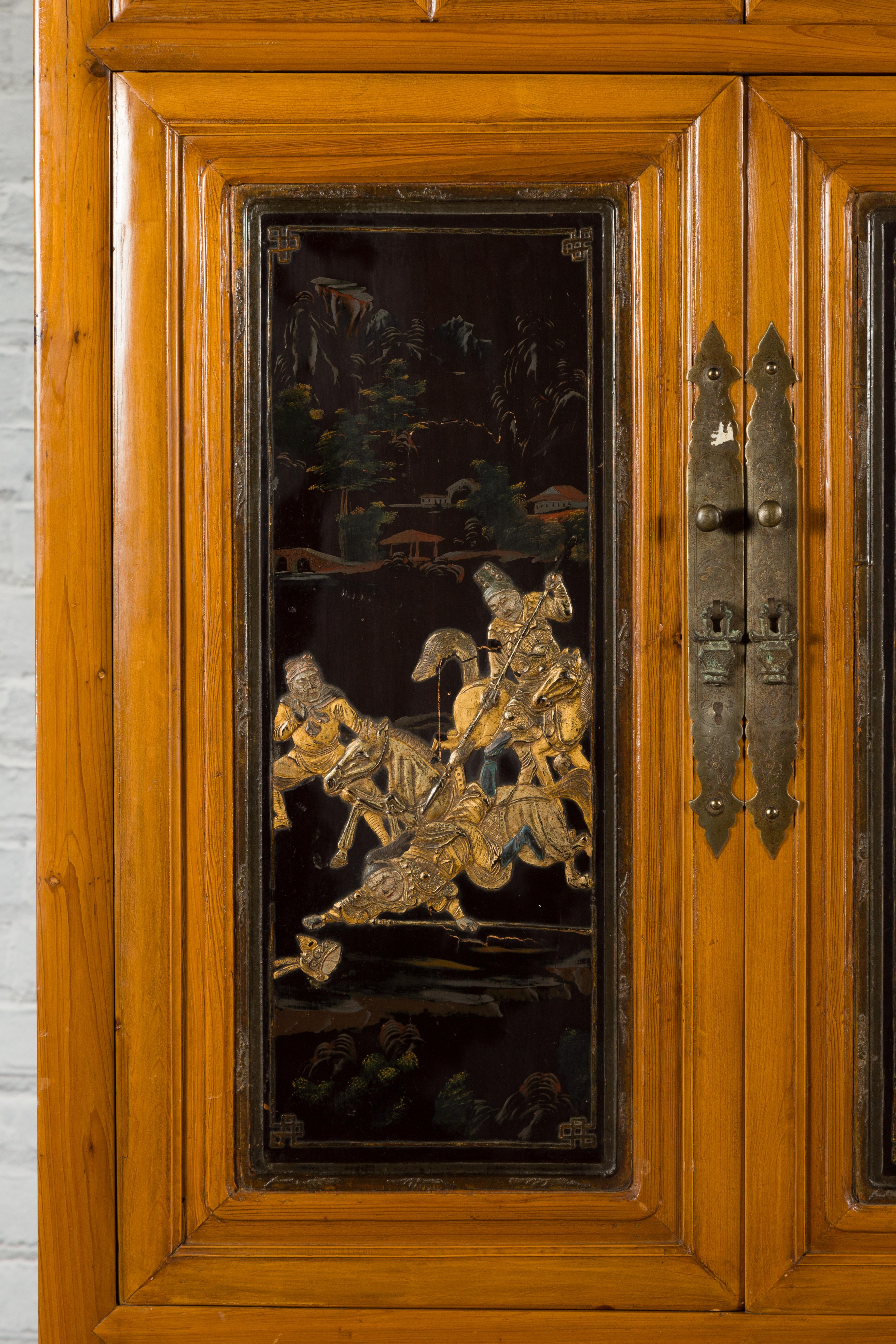 Chinese Early 20th Century Lacquered Armoire with Gilt Carved Warrior Motifs For Sale 6