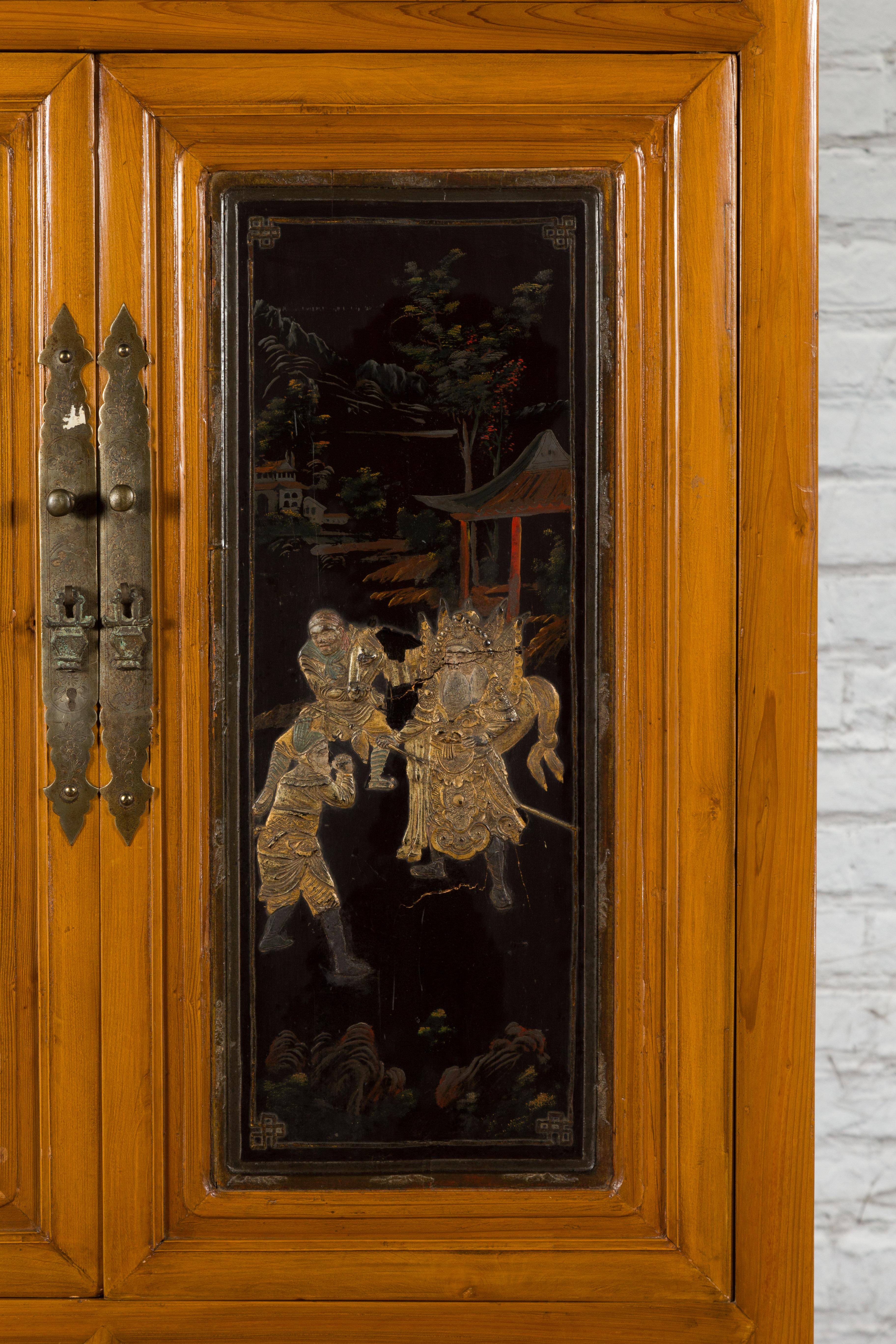 Chinese Early 20th Century Lacquered Armoire with Gilt Carved Warrior Motifs For Sale 7
