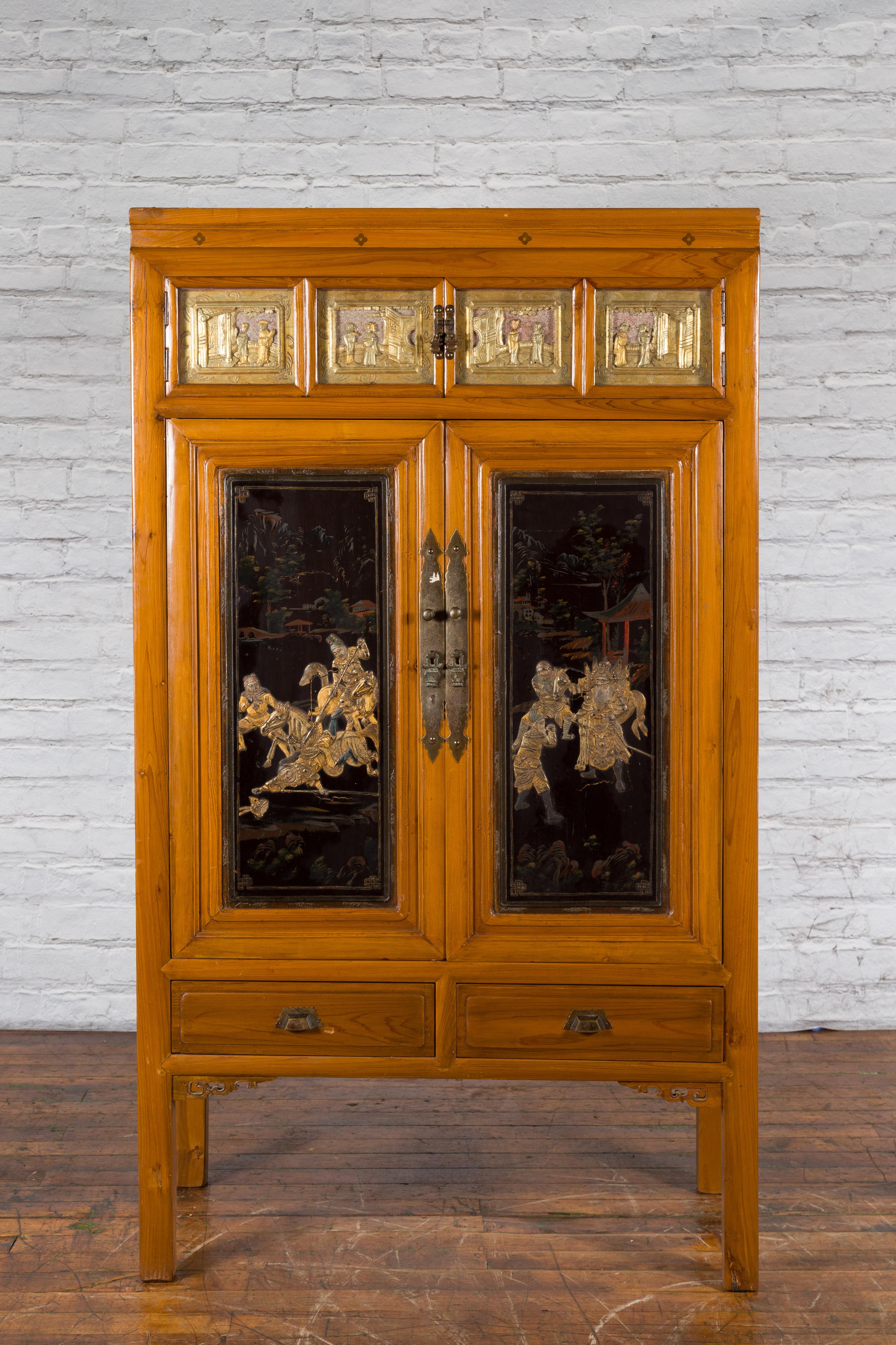Chinese Early 20th Century Lacquered Armoire with Gilt Carved Warrior Motifs In Good Condition For Sale In Yonkers, NY