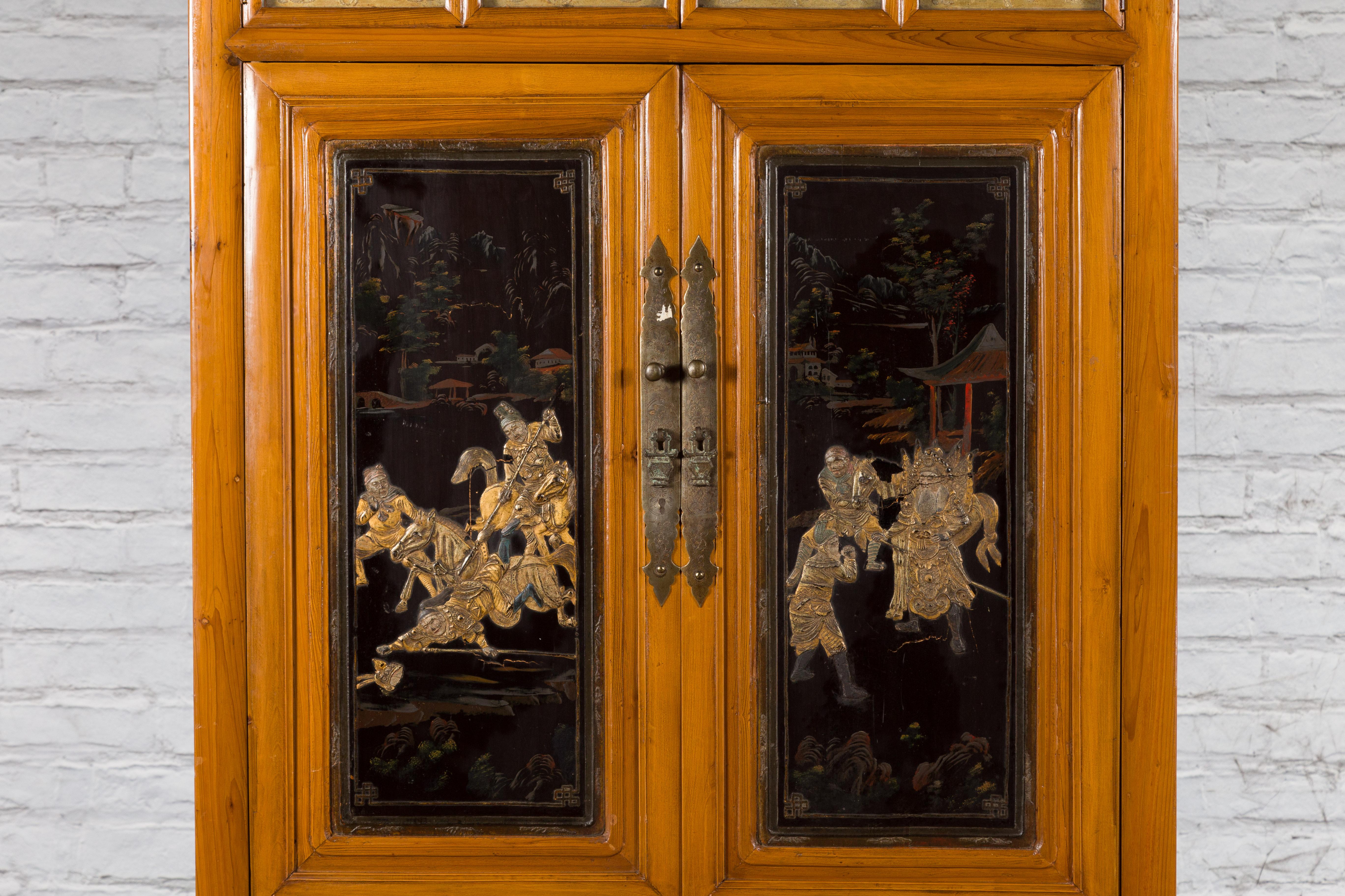 Chinese Early 20th Century Lacquered Armoire with Gilt Carved Warrior Motifs For Sale 2