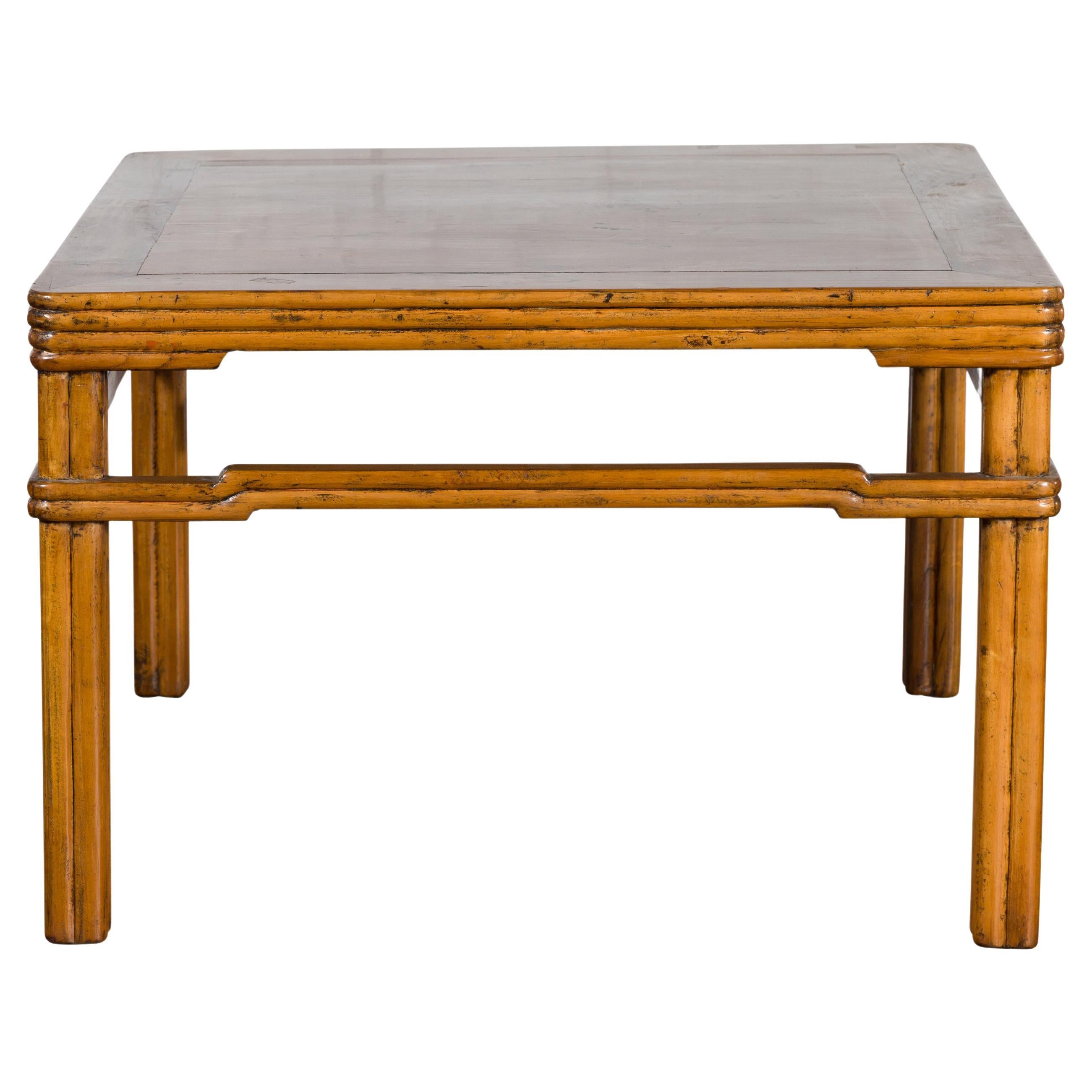Chinese Early 20th Century Light Brown Low Side Table with Humpback Stretchers For Sale