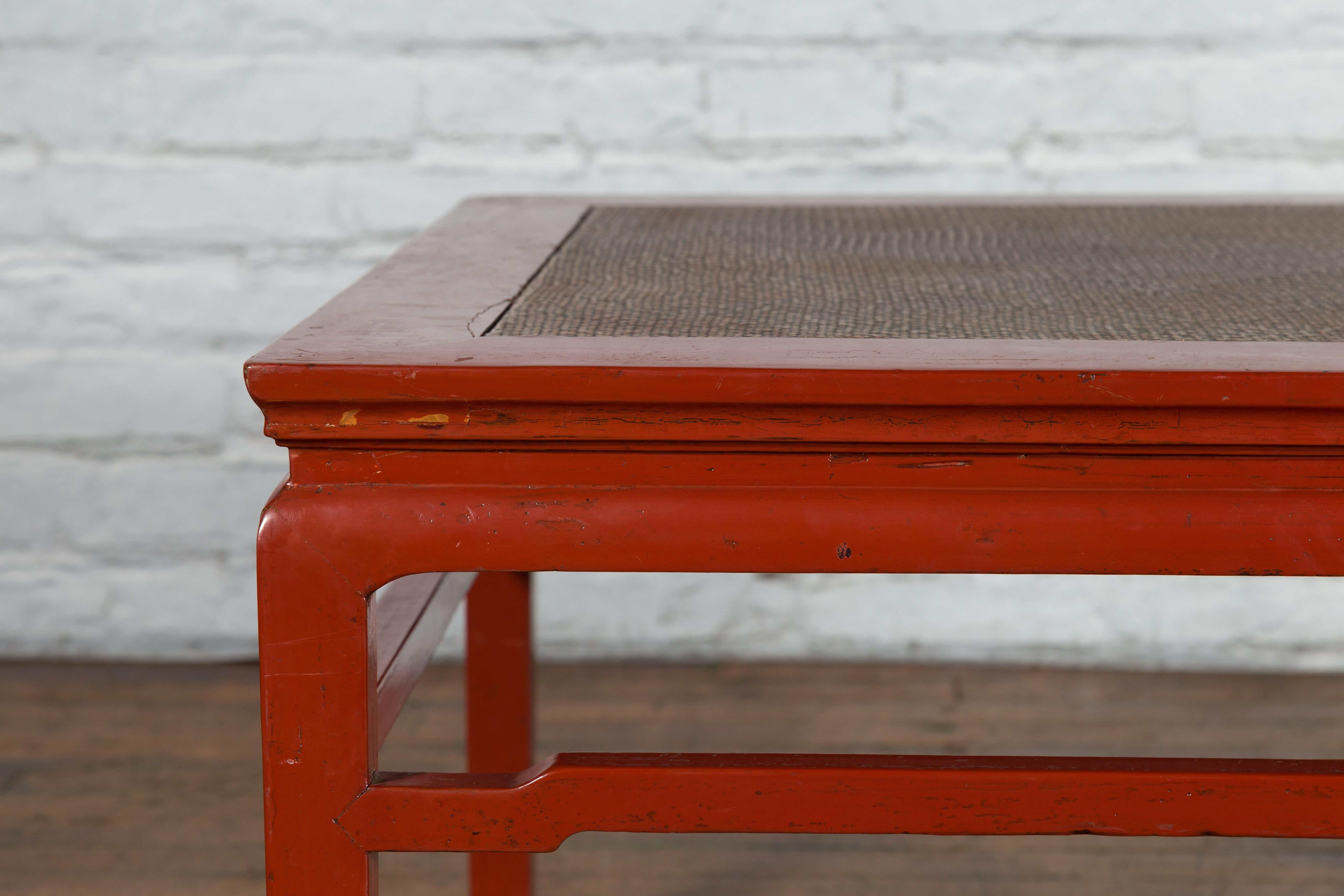 Chinese Early 20th Century Red Lacquer Coffee Table with Hand-Woven Rattan Top In Good Condition For Sale In Yonkers, NY