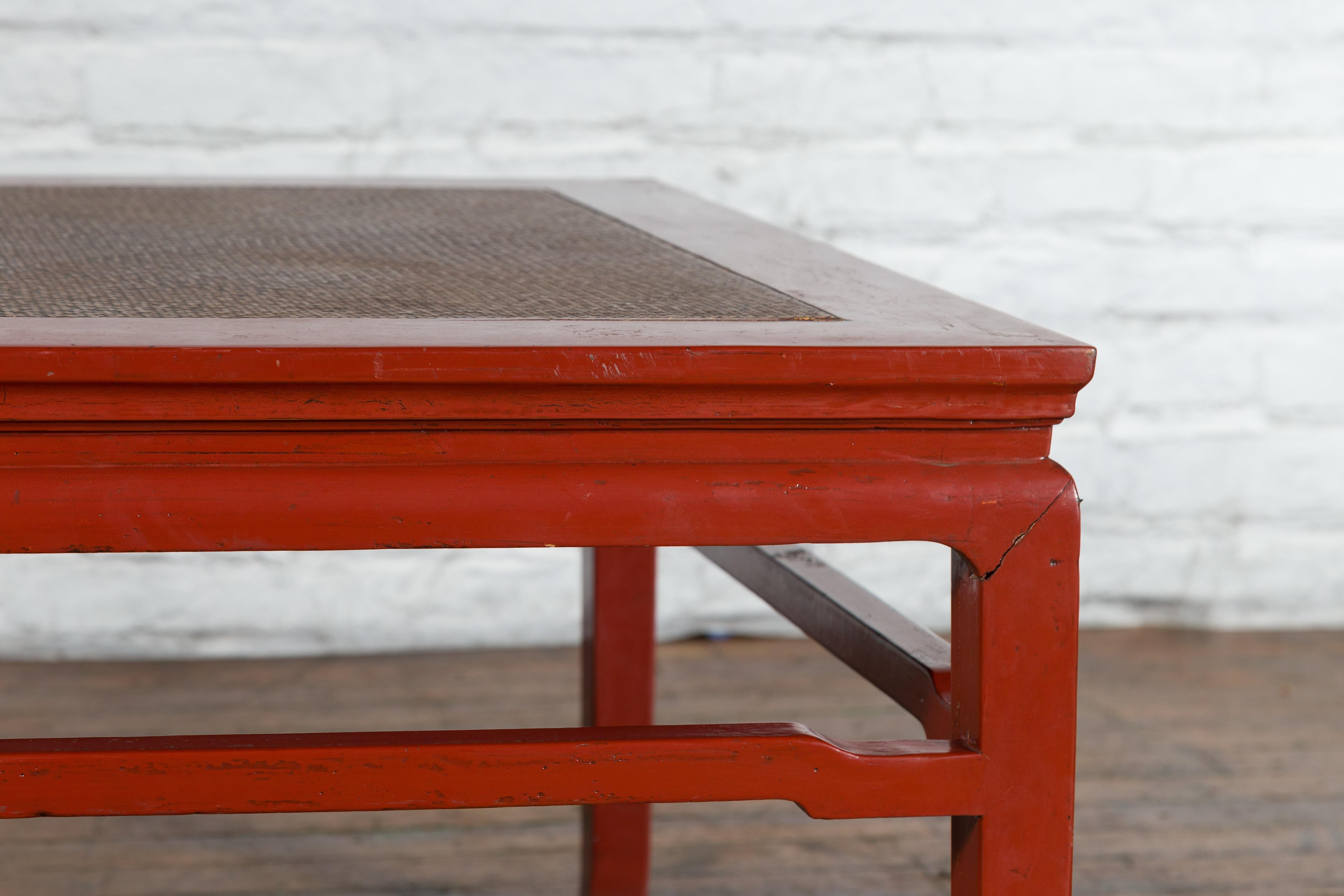 Wood Chinese Early 20th Century Red Lacquer Coffee Table with Hand-Woven Rattan Top For Sale