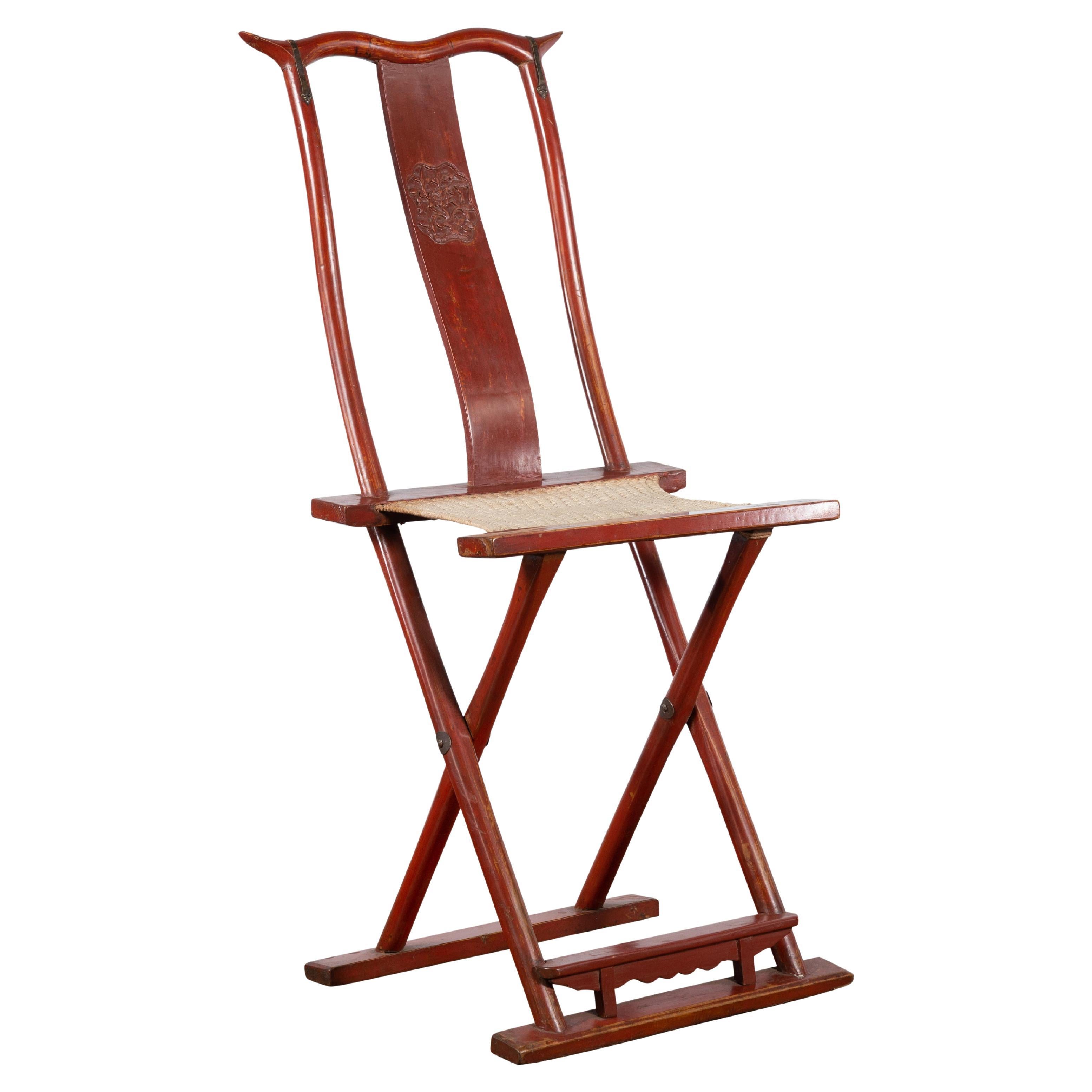 Chinese Early 20th Century Red Lacquer Traveller's Folding Chair with Woven Seat