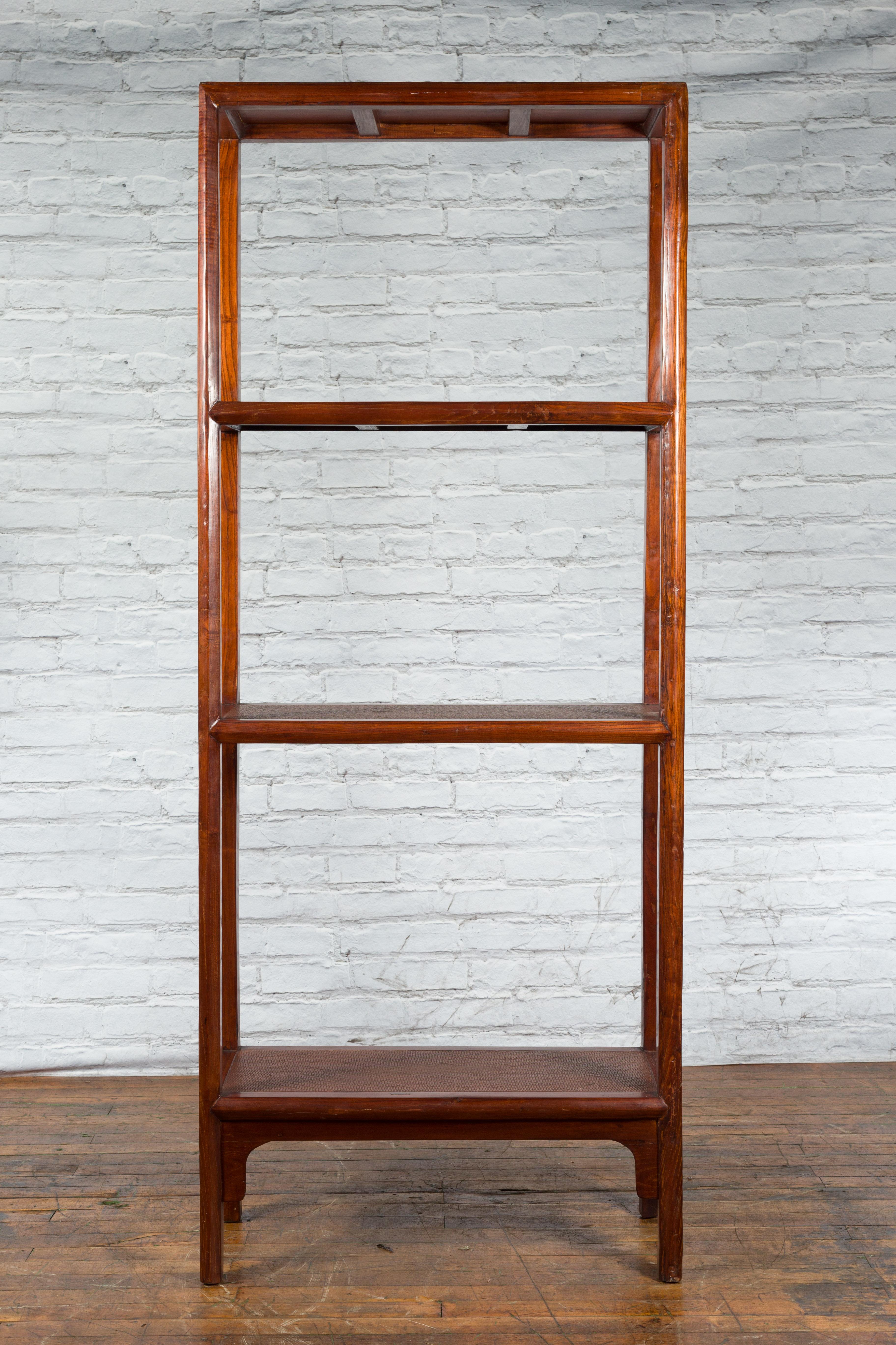 Lacquered Chinese Early 20th Century Wooden Bookcase with Woven Rattan Shelves and Apron For Sale