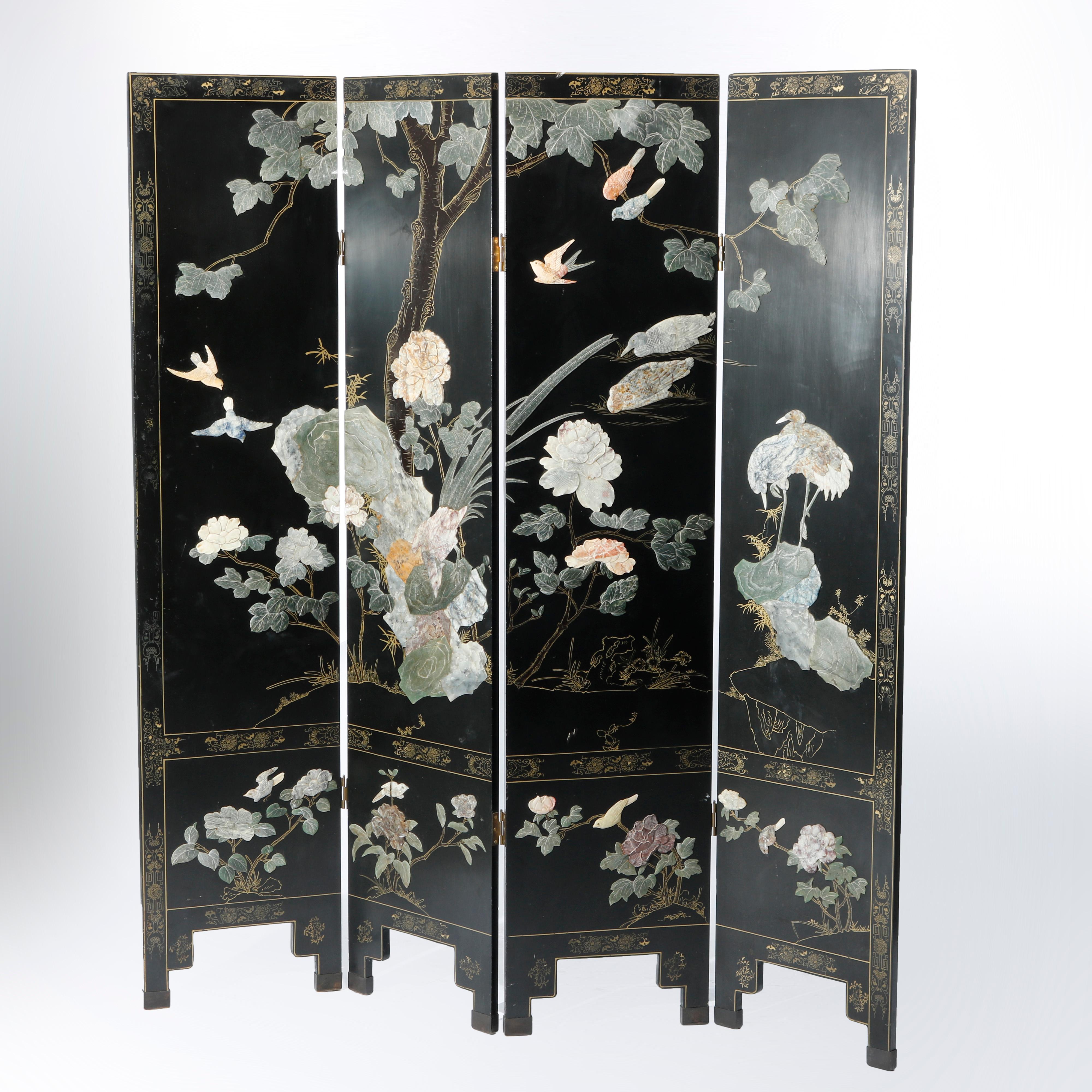 A Chinese dressing screen offers four ebonized panels having continuous garden scene with carved hardstone birds and flowers including gilt painted elements, 20th century

Measures - 72''H x 64.5''W x .75''D.
 
