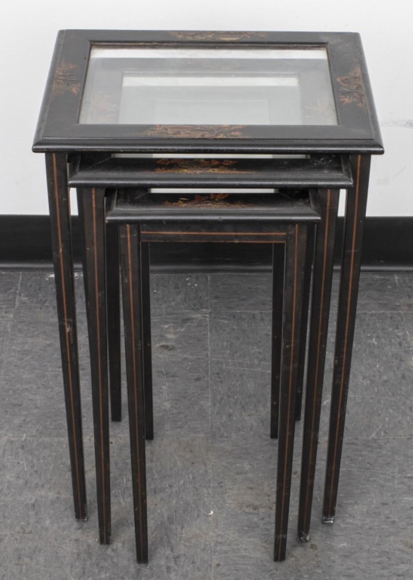 Set of Three Chinese Ebonized Nesting Tables

Features: Ebonized nesting tables with center glass inserts and polychrome architectural motifs to borders.

Dealer: S138XX