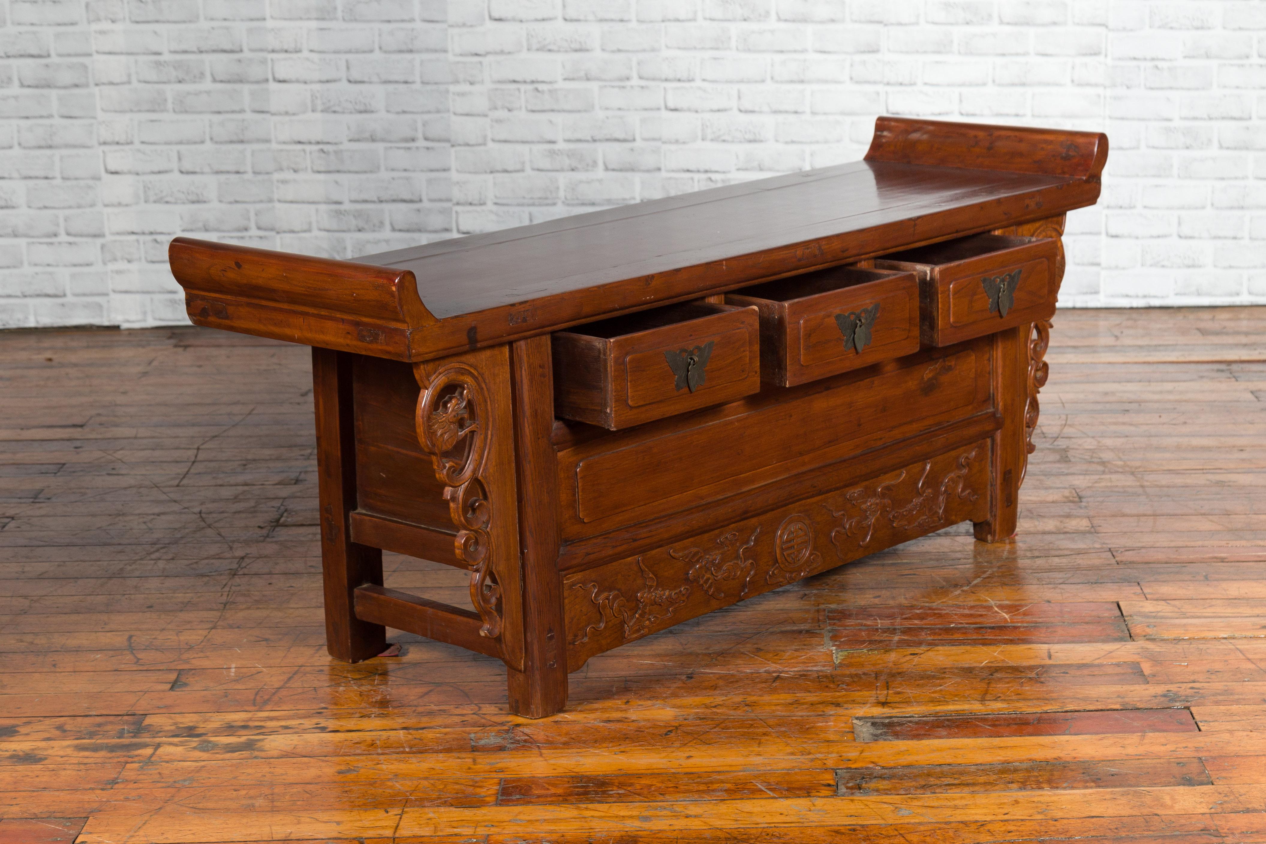 Qing Chinese Elm Three-Drawer Kang Cabinet with Everted Flanges and Carved Spandrels For Sale