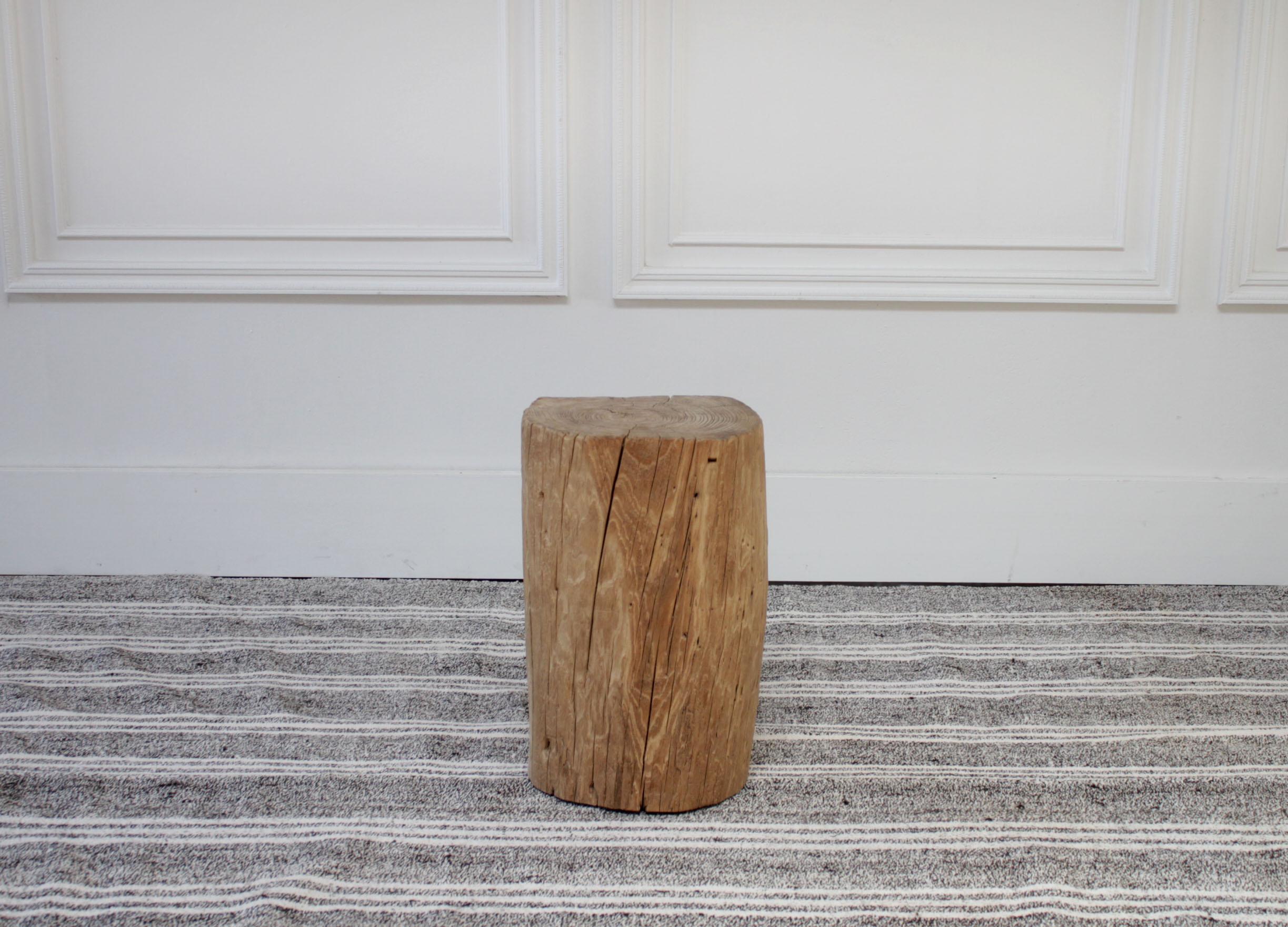 Chinese elmwood side table or stool
Perfect side table next to a sofa or between chairs, this stump can also be used in a bathroom to hold a candle or your towels.
Measures: 12 x 9.5 x 19 H.

  