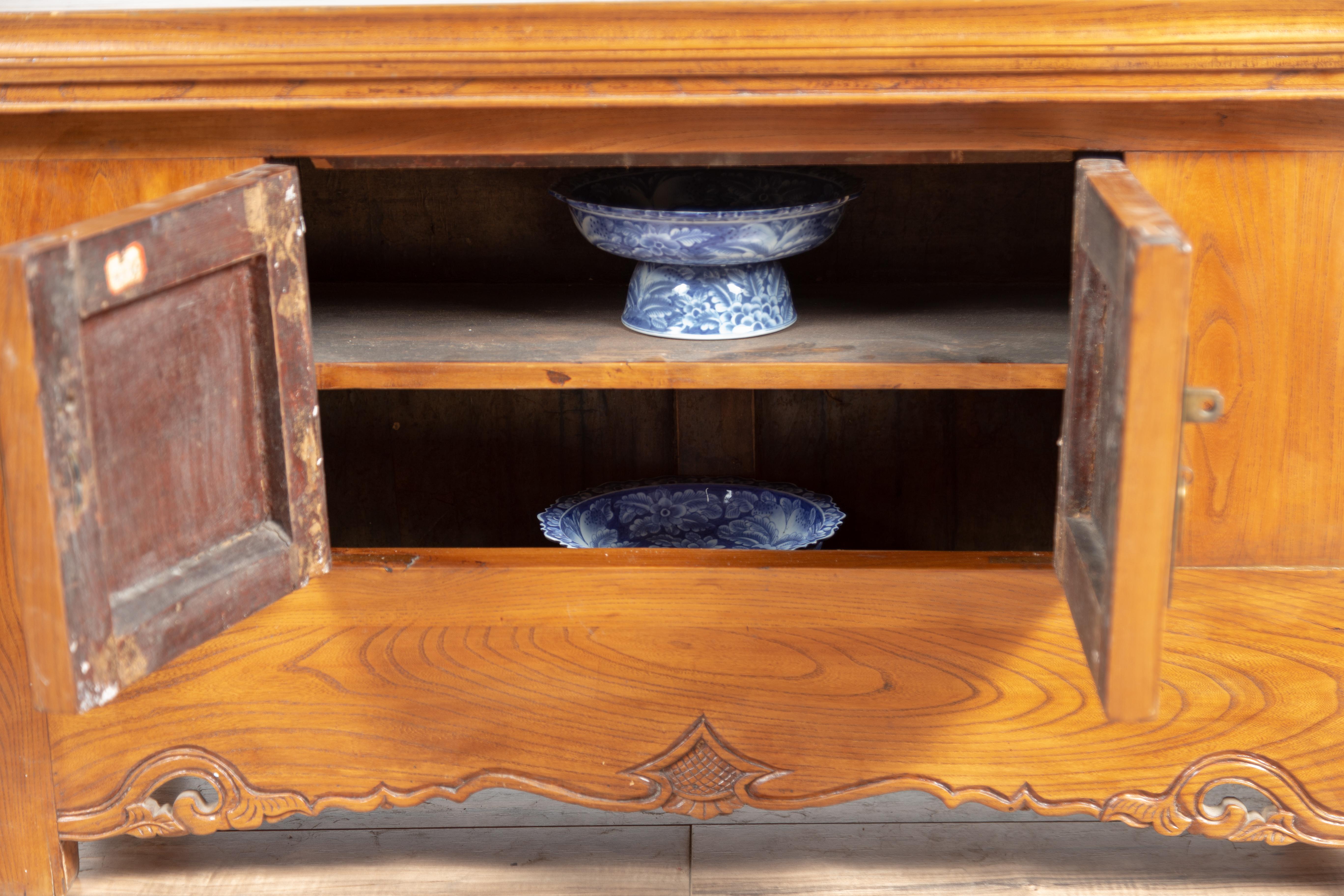 Qing Dynasty Elmwood Two-Door Low Kang Cabinet with Everted Flanges and Scrolls For Sale 8
