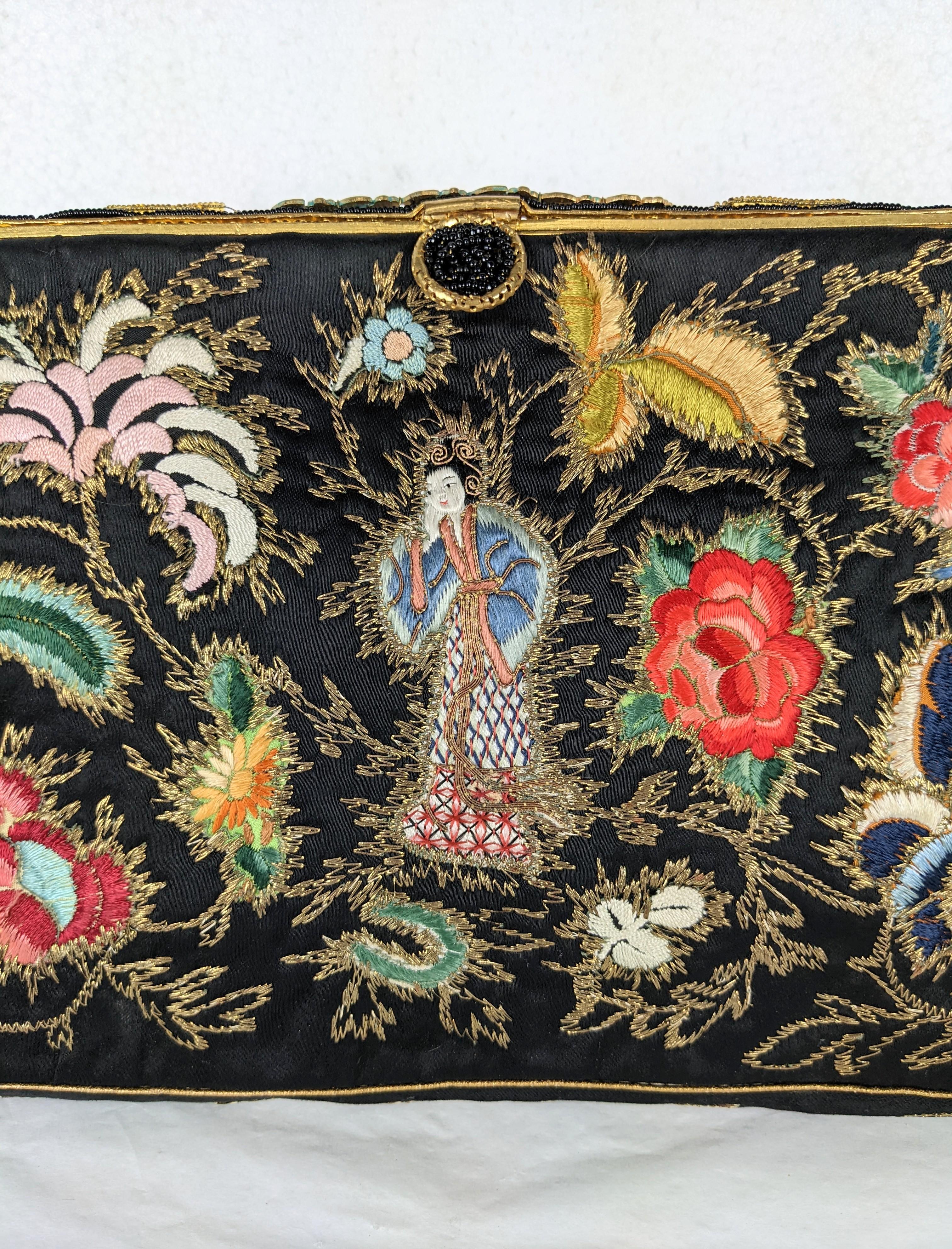 black embroidered clutch bag