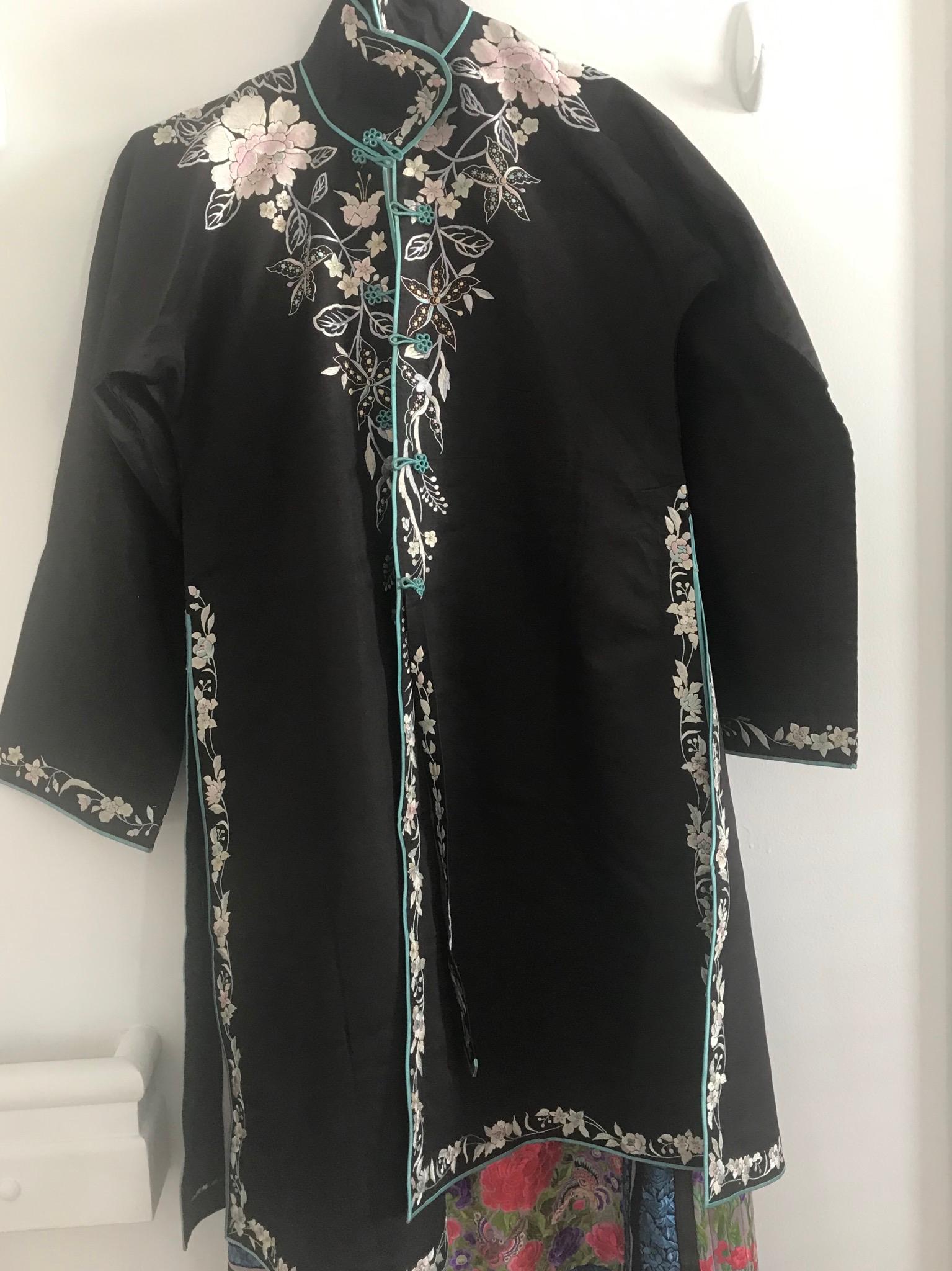 Silk embroidered robe and skirt.