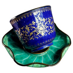 Chinese Enamel Cup in Lotus Leaf Stand, 18th Century