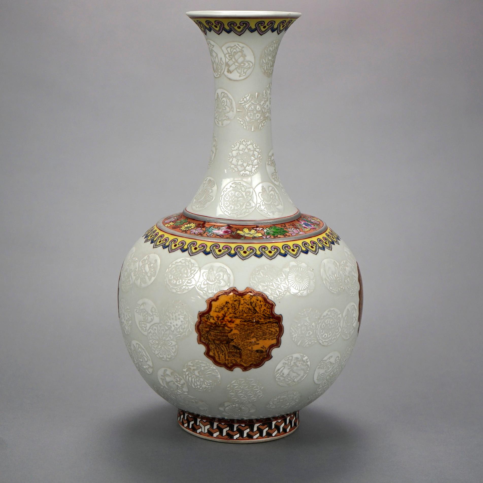 A Chinese vase offers embossed porcelain construction in bulbous form with hand enameled floral and collar decoration, stamped on base as photographed, 20th century

Measures- 13.25''H x 7.5''W x 7.5''D.