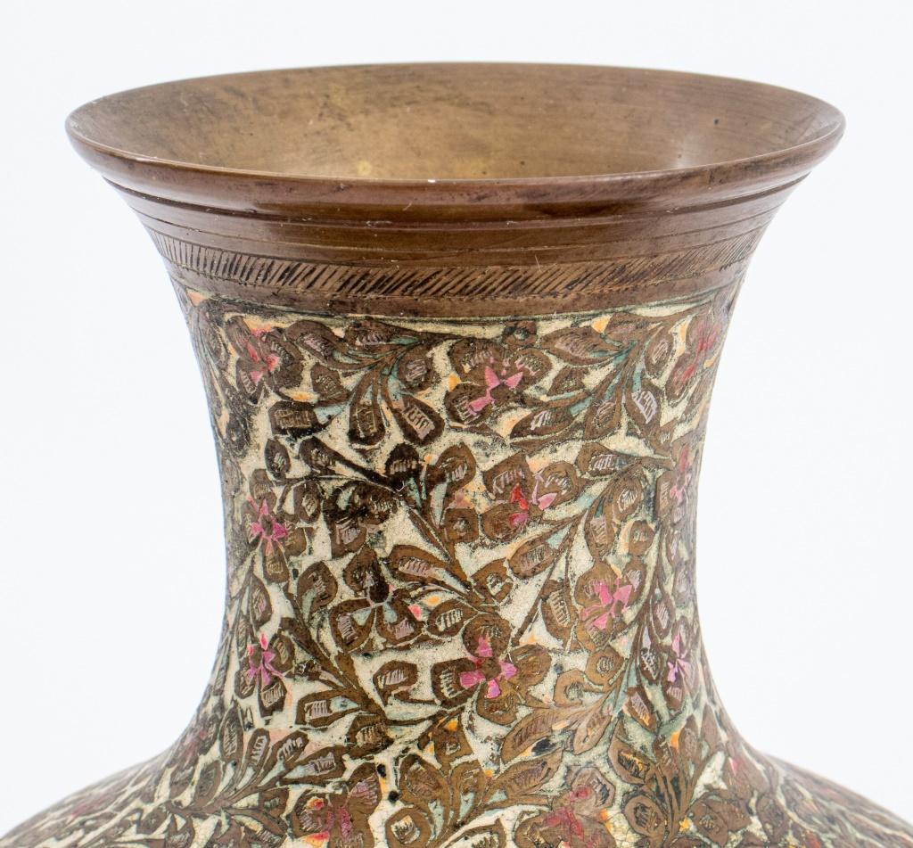 Chinese enameled brass vase, likely for the Persian Market, with allover floral design in Qajar style, the baluster form vase enameled in white, rust, and green  9.75