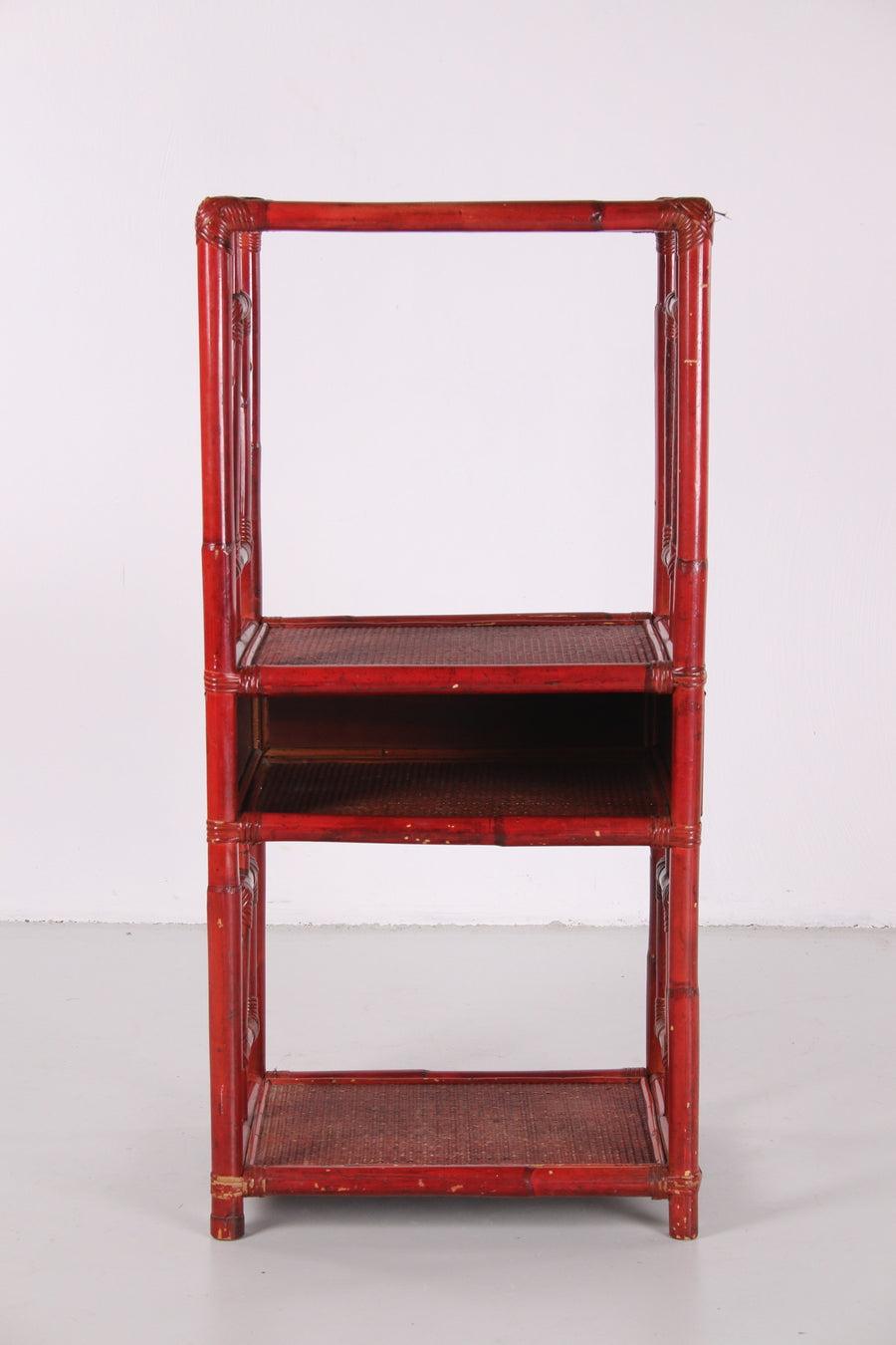 This is a very nice bamboo wall rack or cream divader, the color is old red.

This rack comes from China, probably made around 1900.

Can be used for various things to place books or to make a small partition somewhere.

It has 4 plateaus and is