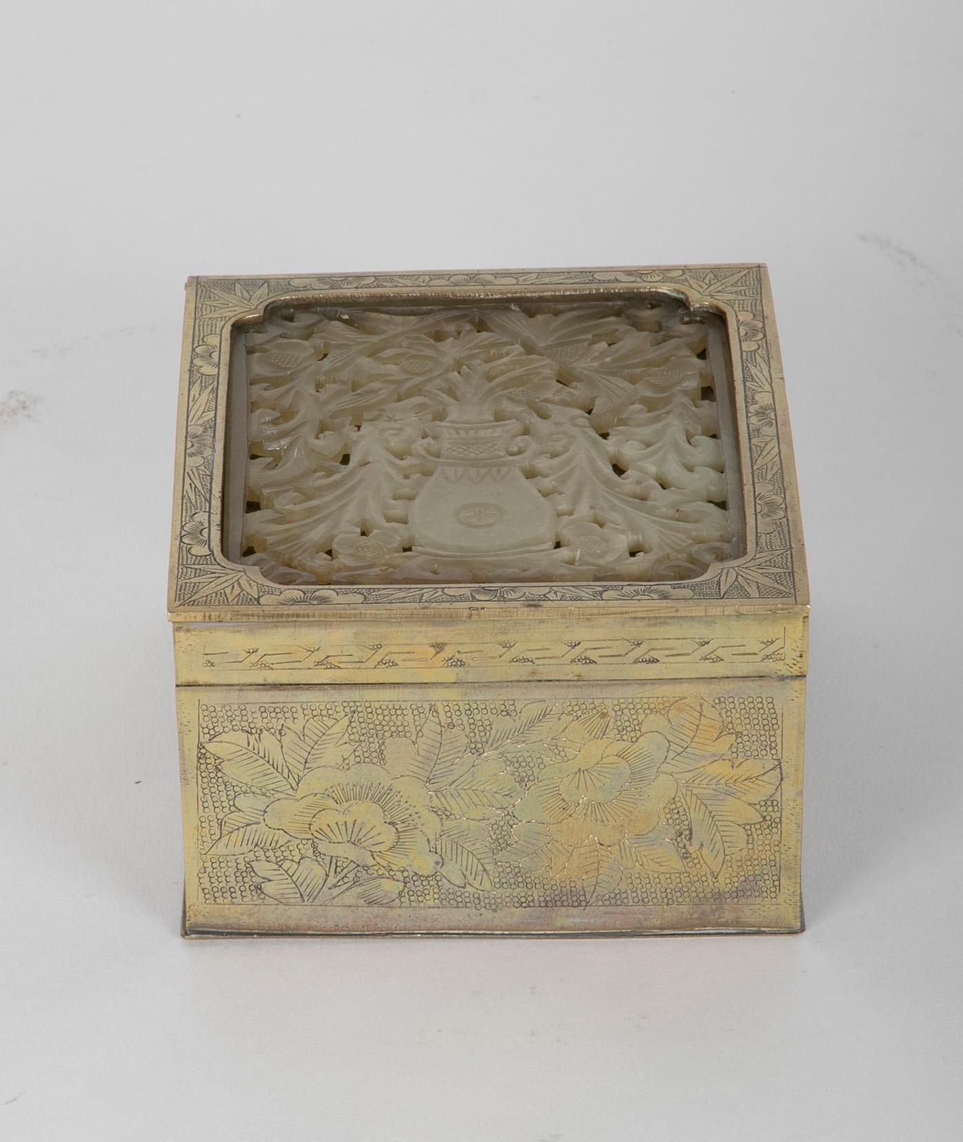 Sweet little Chinese export brass box with beautiful floral etched designs, looks like peonies to me. With a lovely white jade top carved in fretwork with a vase framed by the flowers pouring forth from it and surrounding it. A very elegant overall