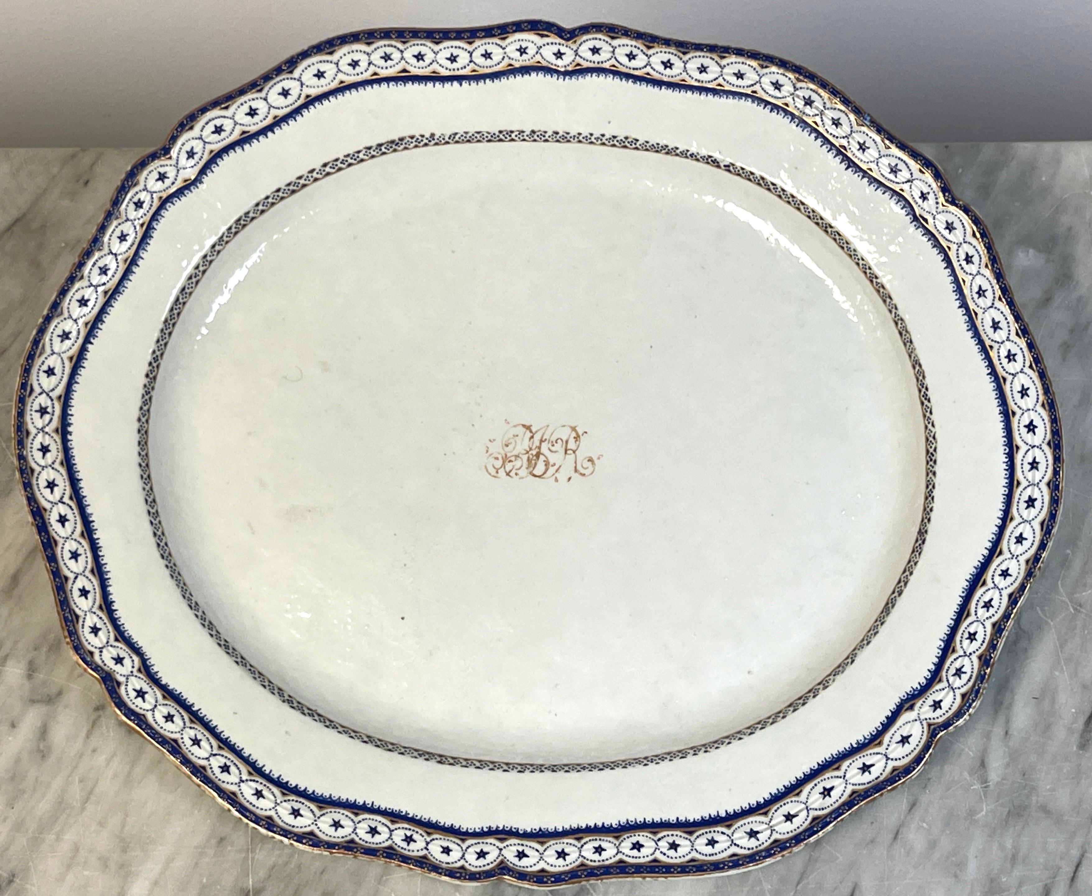 Chinese Export American market, blue & white 'star' boarder armorial platters 
China for American Market, Circa 1790s

A rare and unique example of Chinese Famille-Verte porcelain, made for the American Market. This scalloped platter of a fine