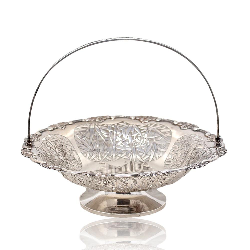 Highly Detailed Silver

From our Chinese collection, we are delighted to offer this Chinese Export Silver Basket by Wang Hing. The Silver Basket of circular form expertly crafted with sprigs of blossoming flowers to the outer boarder housing four