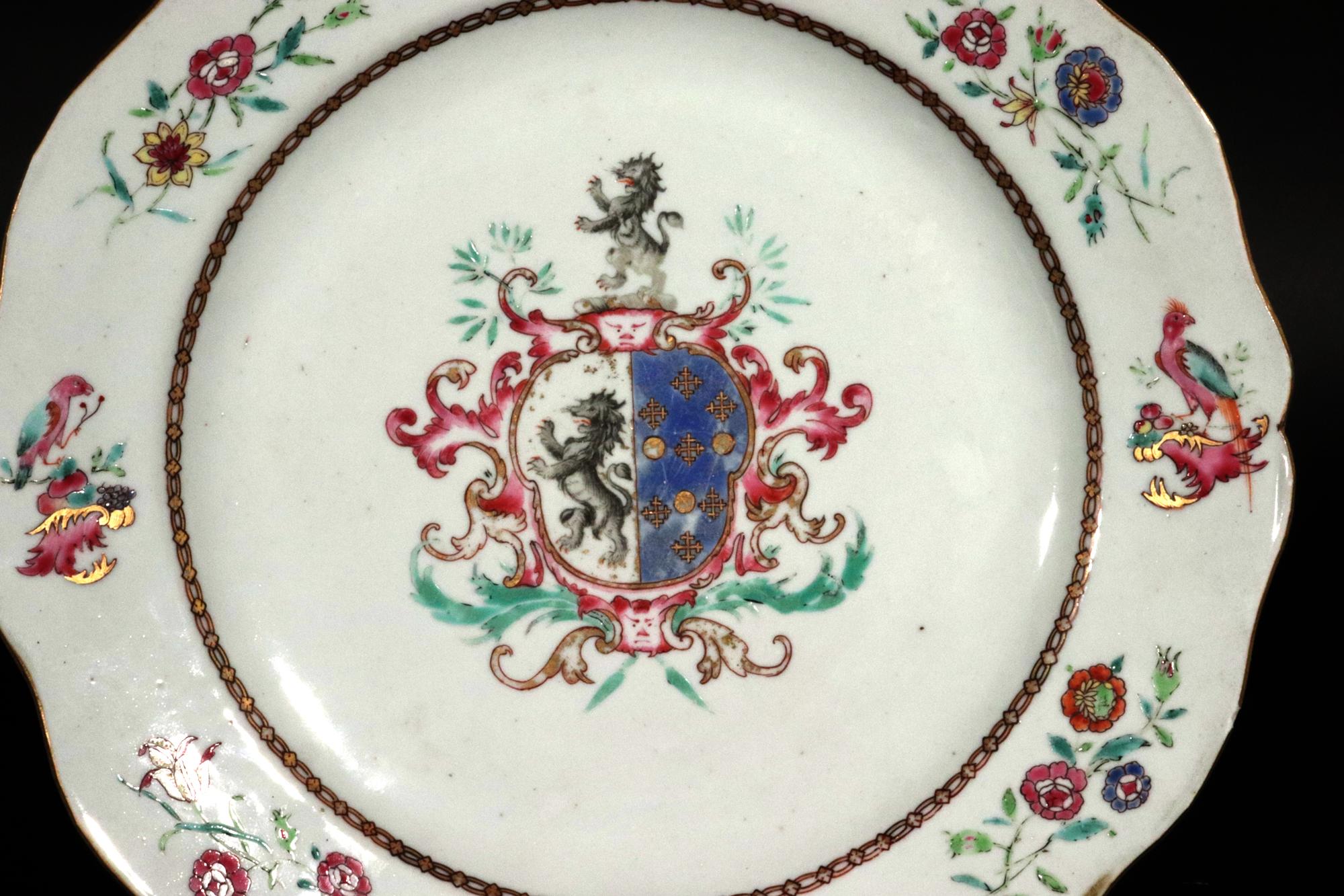 Chinese Export Armorial Famille Rose Plate,
Arms of Poley Impaling Coffin,
Circa 1755.

The attractive Chinese Export Amorial porcelain plate with a shaped wavy rim depicts a central coat of arms which David Howard attributed to the Poley family and