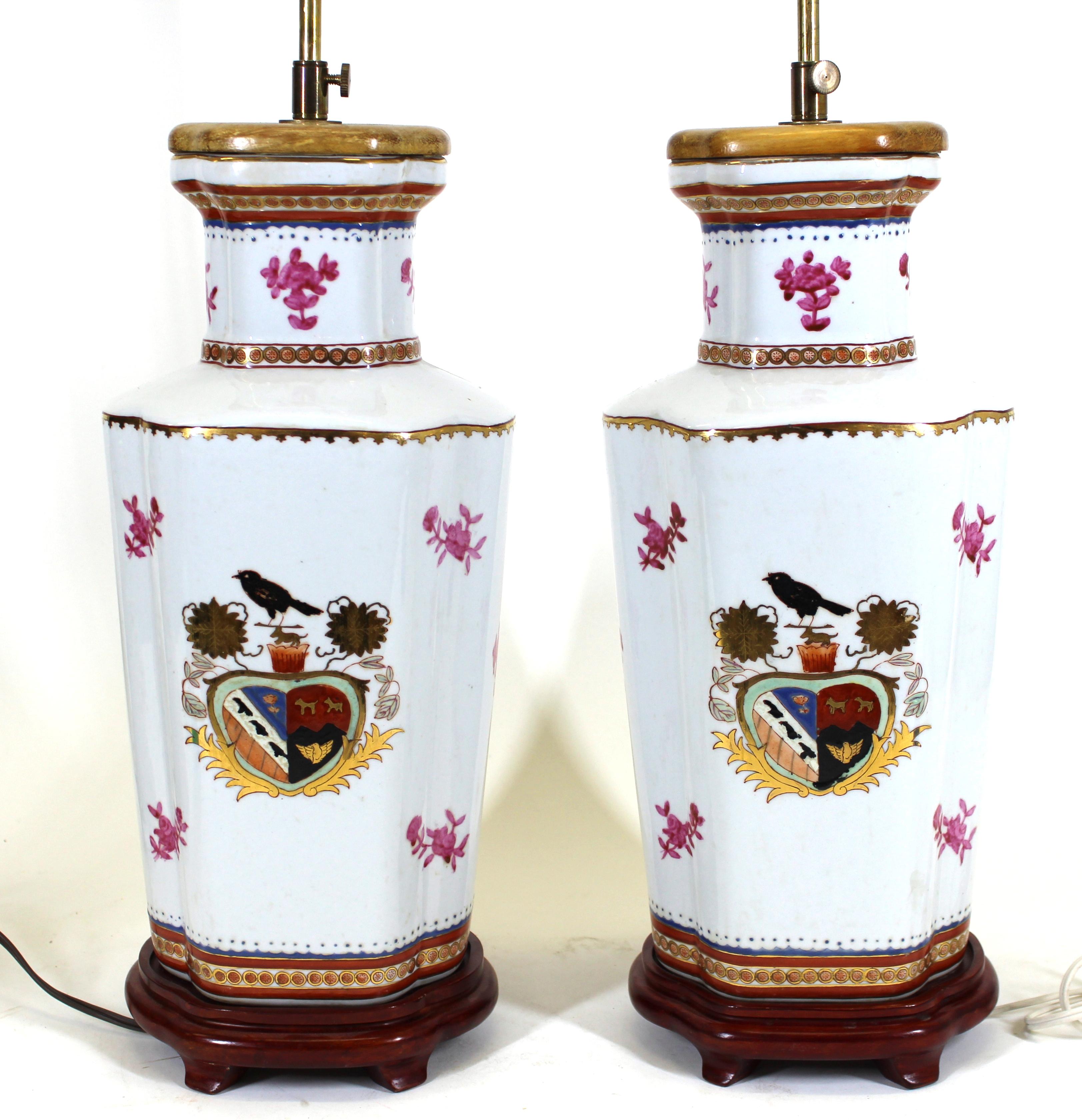 Chinese Export pair of armorial crest porcelain vases mounted as table lamps. In great vintage condition with age-appropriate wear.