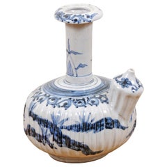Chinese Export Blue and White Porcelain Tall Neck Teapot with Scrolling Foliage