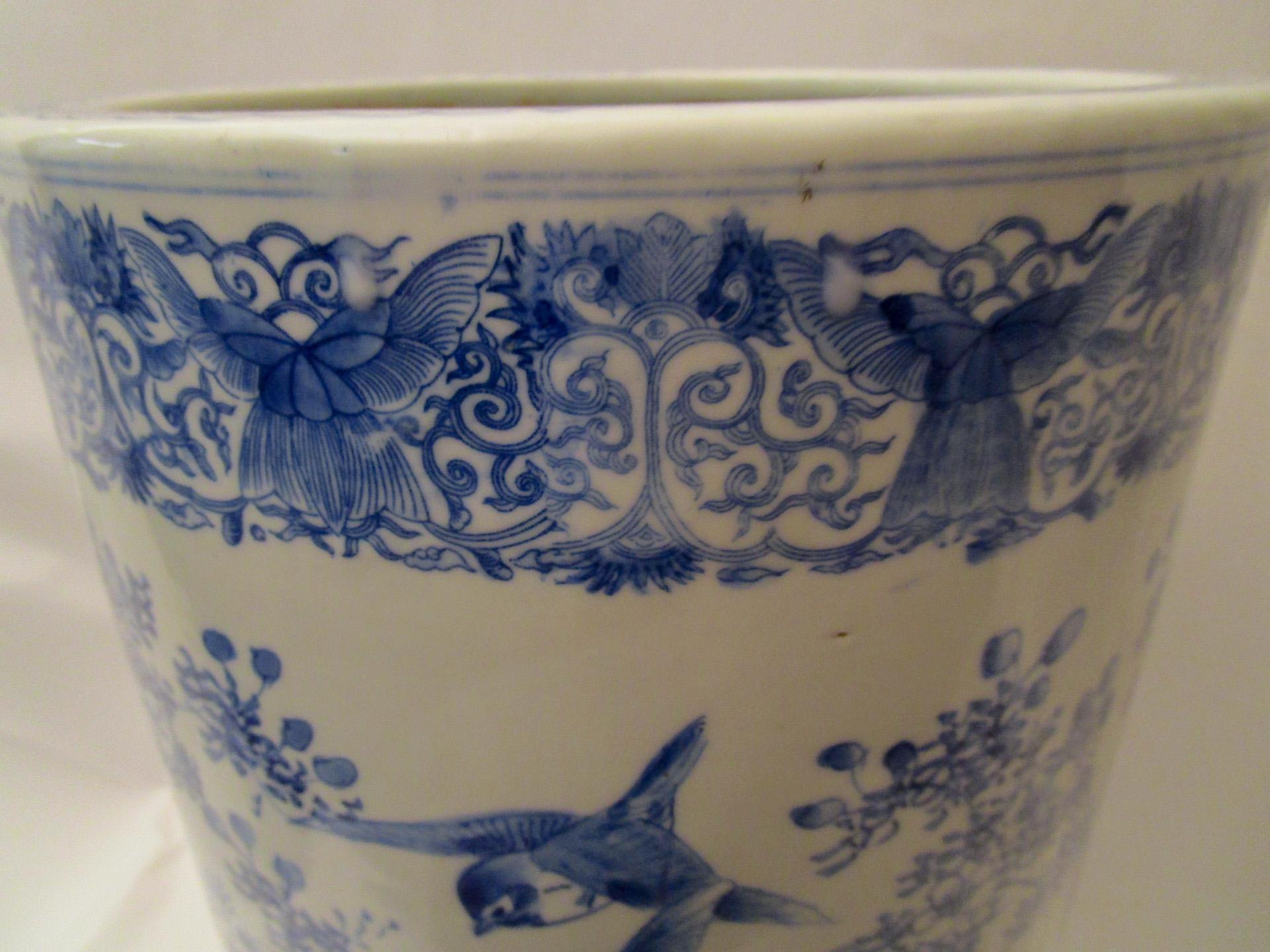 Decorative blue and white porcelain Chinese export umbrella stand that could be also used as a vase. Lovely detail including birds, flowers, scroll designs and a modified Greek Key border.