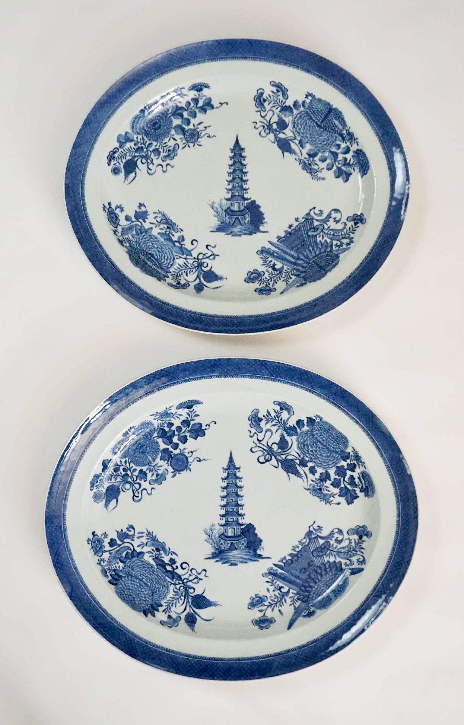 An extremely rare and wonderful set of two blue-and-white Chinese export porcelain graduated platters of large size from the famous 