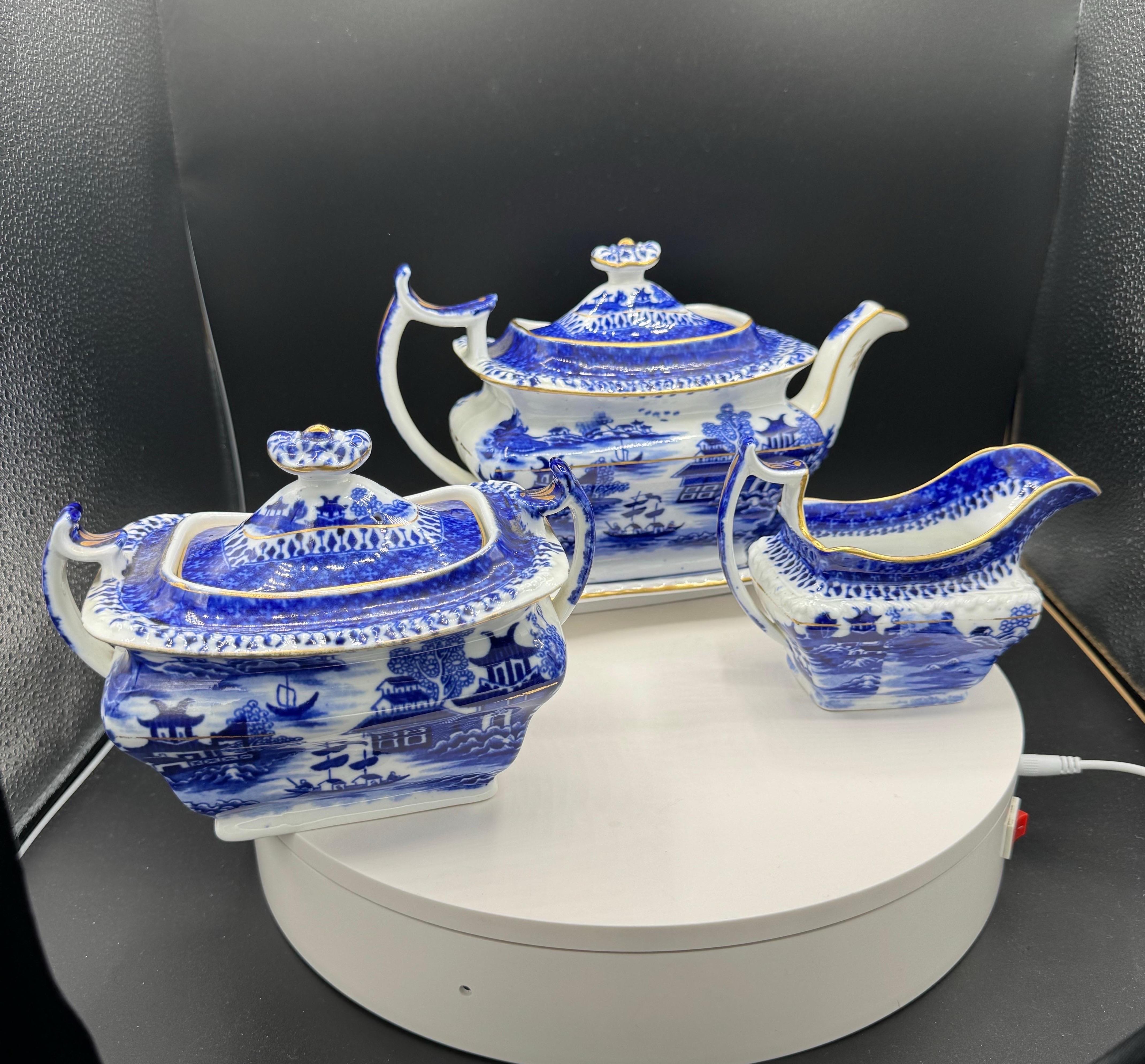 Chinese Export Blue & White Ceramic Coffee / Tea service With Tea pot, Creamer & sugar Bowl

Tea pot  with lid & tray 
Height  6.75”
Depth   6”
Width   11”

Creamer 
Height 4.5”
Depth 3.25”
Width  6”

Sugar pot w lid 
Height 5”
Depth 4.75”
Width