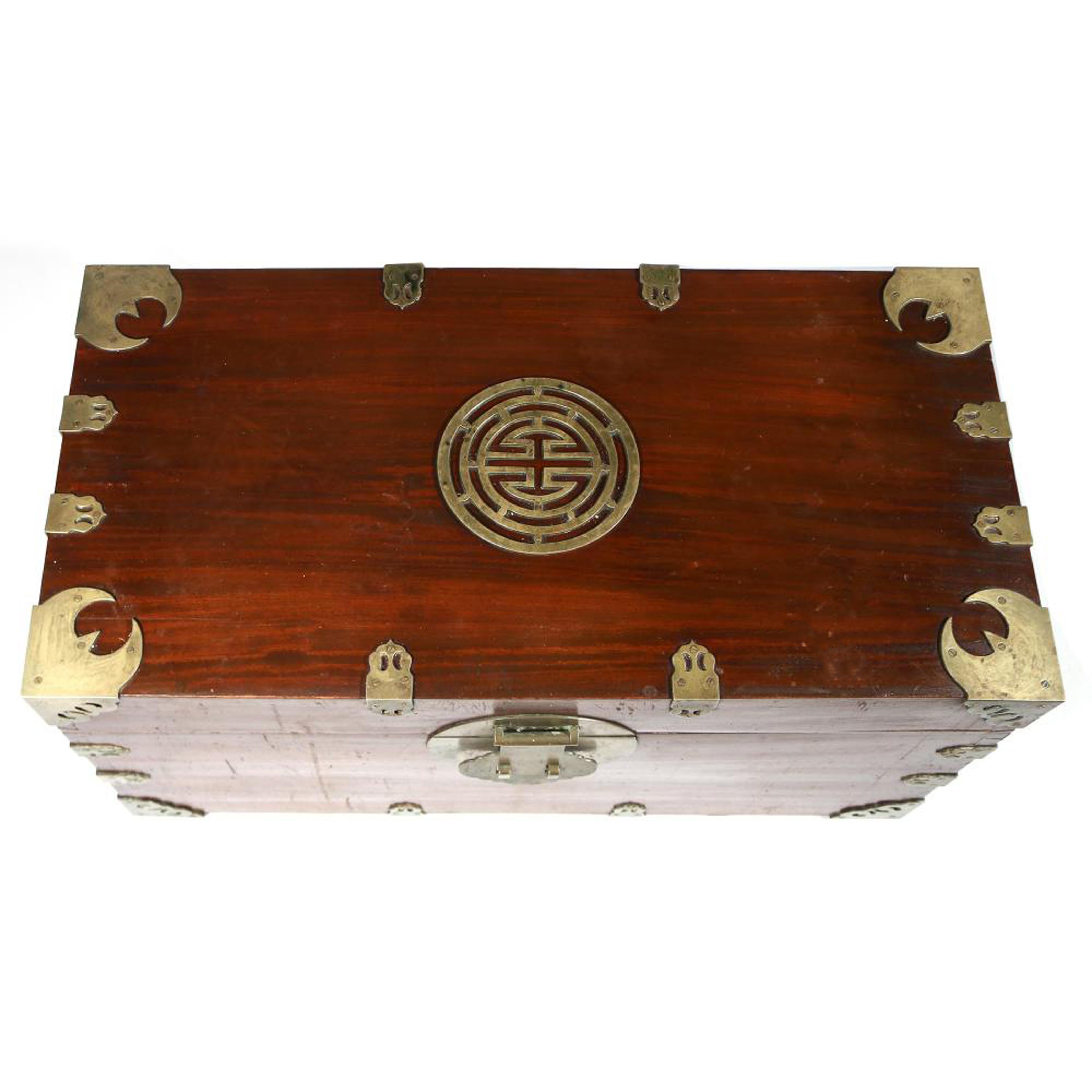 Chinese Export Sailor's Large Brass-bound Camphor Wood Sea or Campaign Chest,
Mid-19th Century.

A large rectangular dramatic campaign or sailor's trunk lined with Camphor wood and with interior inset drawer, the exterior with brass corners and