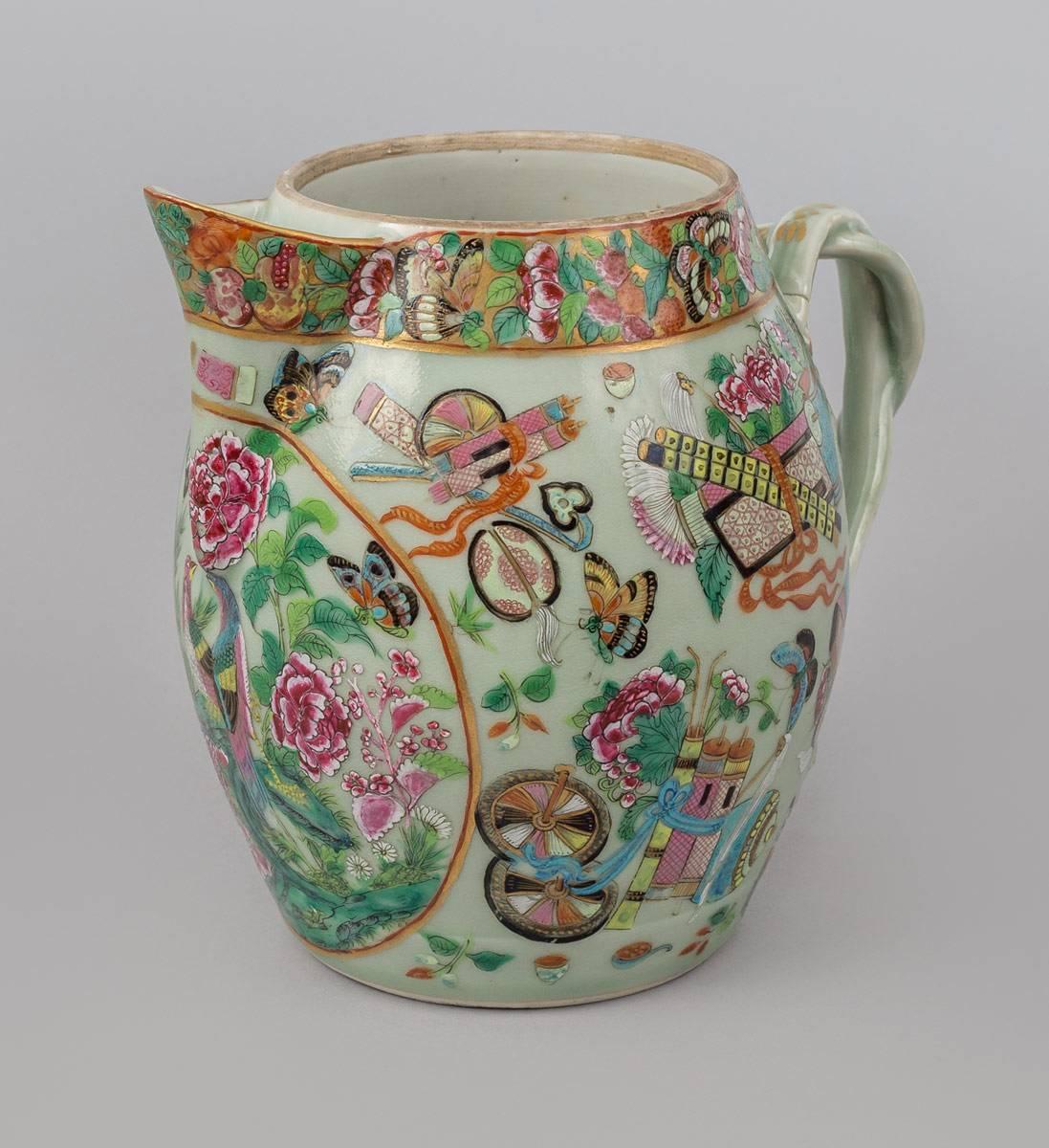 Very unusual large Chinese Export Canton porcelain cider jug in the famille rose palette decorated with exotic birds, butterflies, chrysanthemums, items for celebration, elegant intertwined strapped handles ending in gilded foliate terminals. The
