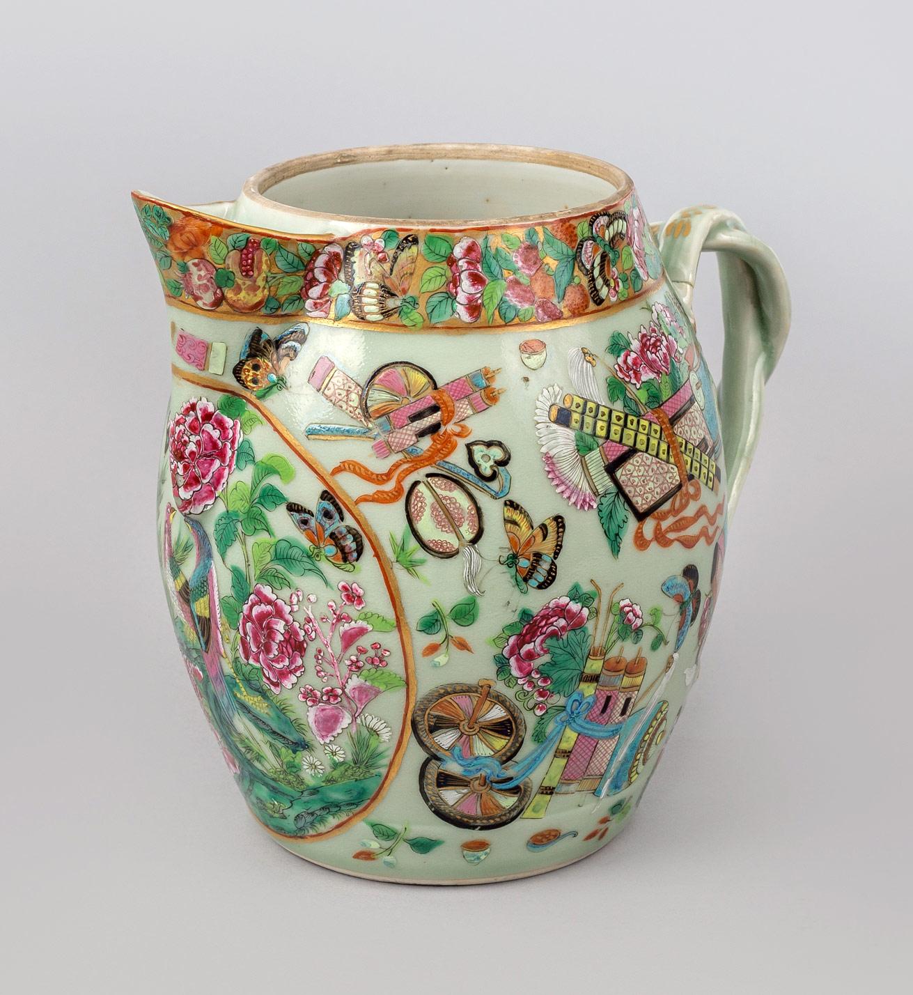 Very unusual large Chinese Export Canton porcelain cider jug in the famille rose palette decorated with exotic birds, butterflies, chrysanthemums, items for celebration, elegant intertwined strapped handles ending in gilded foliate terminals. The