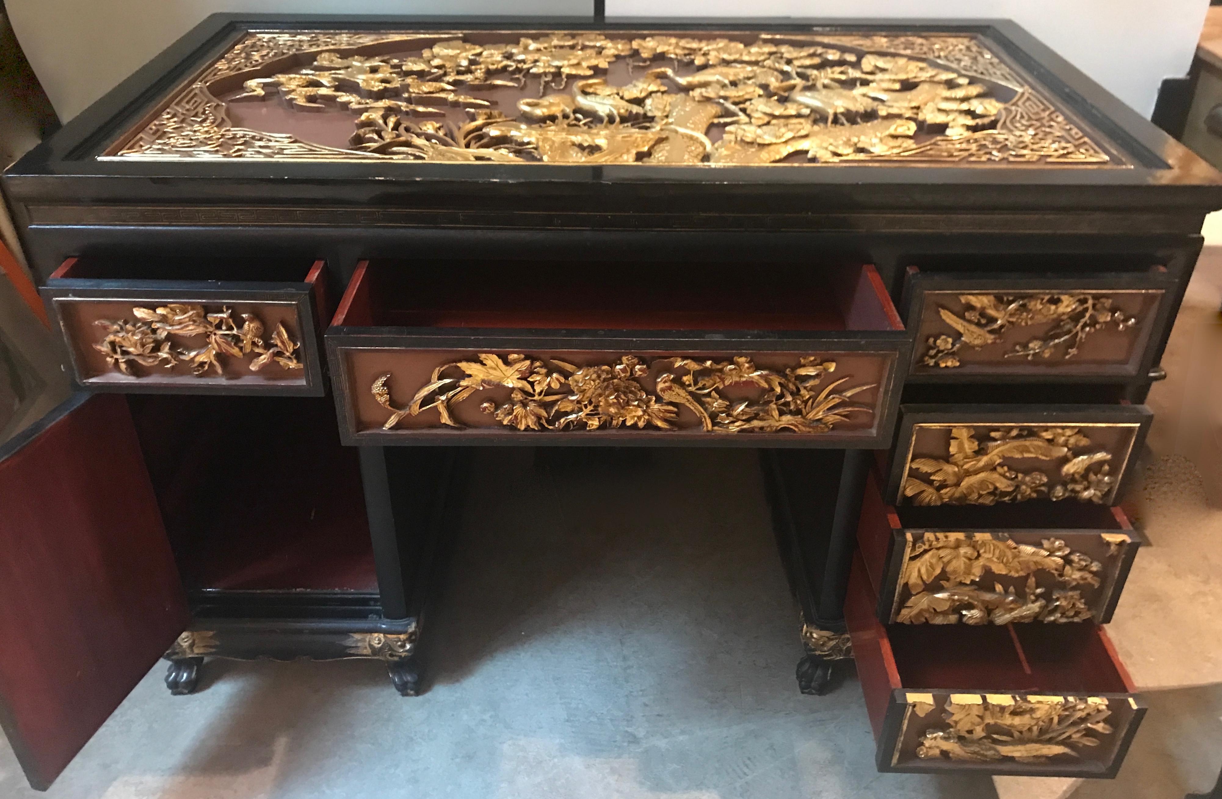 Hand-Carved Antique Chinese Export Carved and Gilded Black Lacquered Desk and Chair For Sale