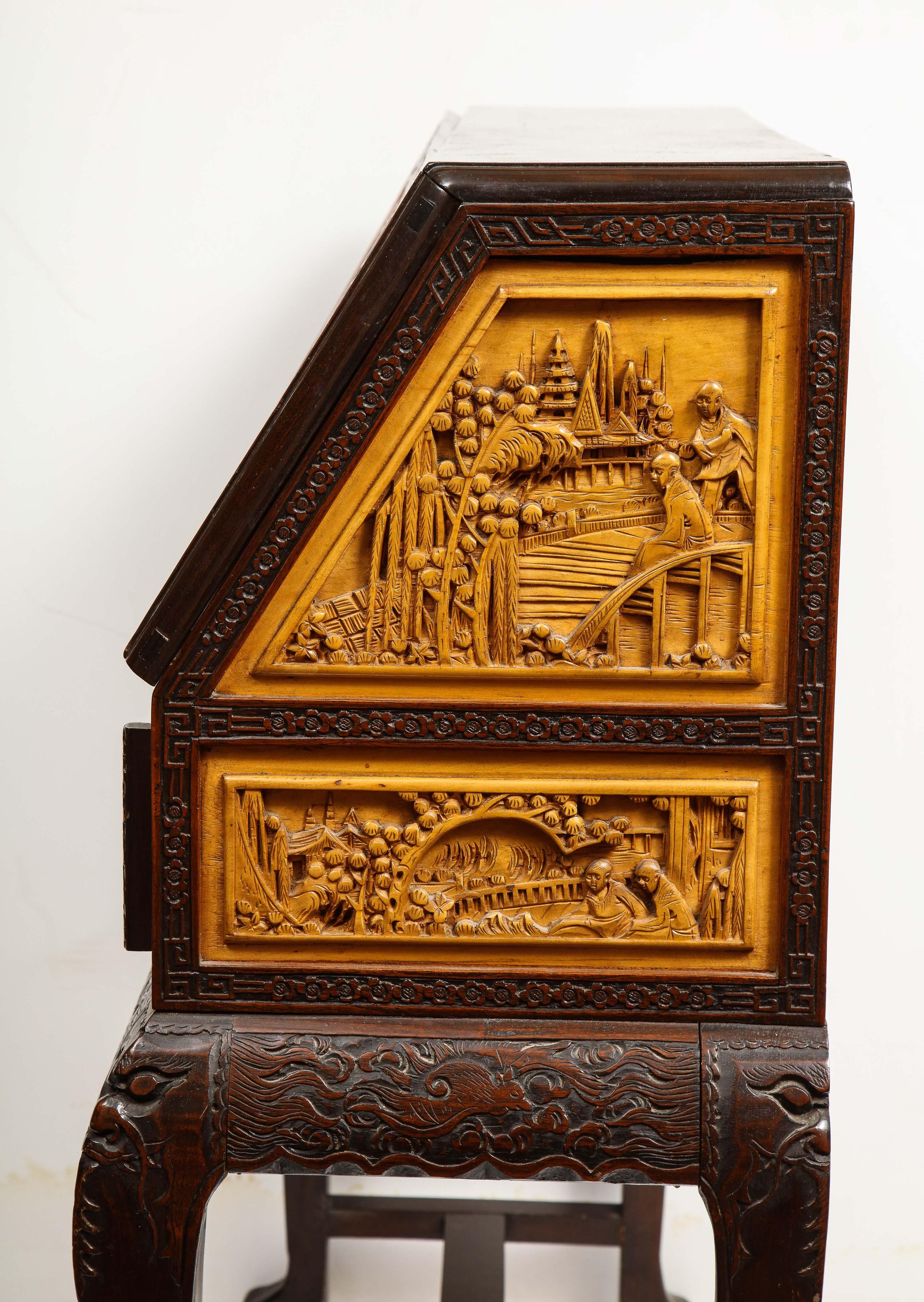 Chinese Export Carved Figural Hard Wood Desk Cabinet, circa 1900s 10