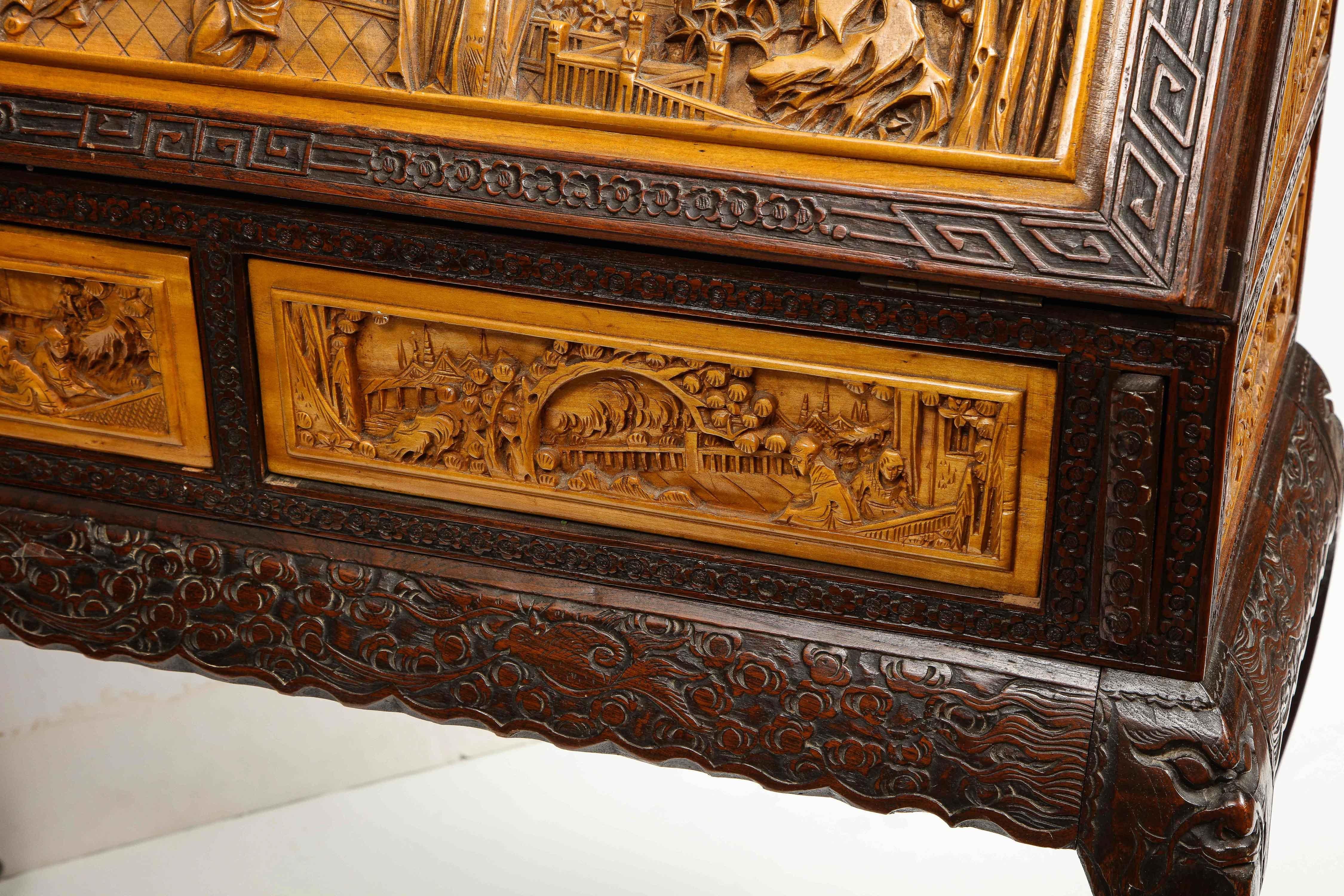 Chinese Export Carved Figural Hard Wood Desk Cabinet, circa 1900s 14