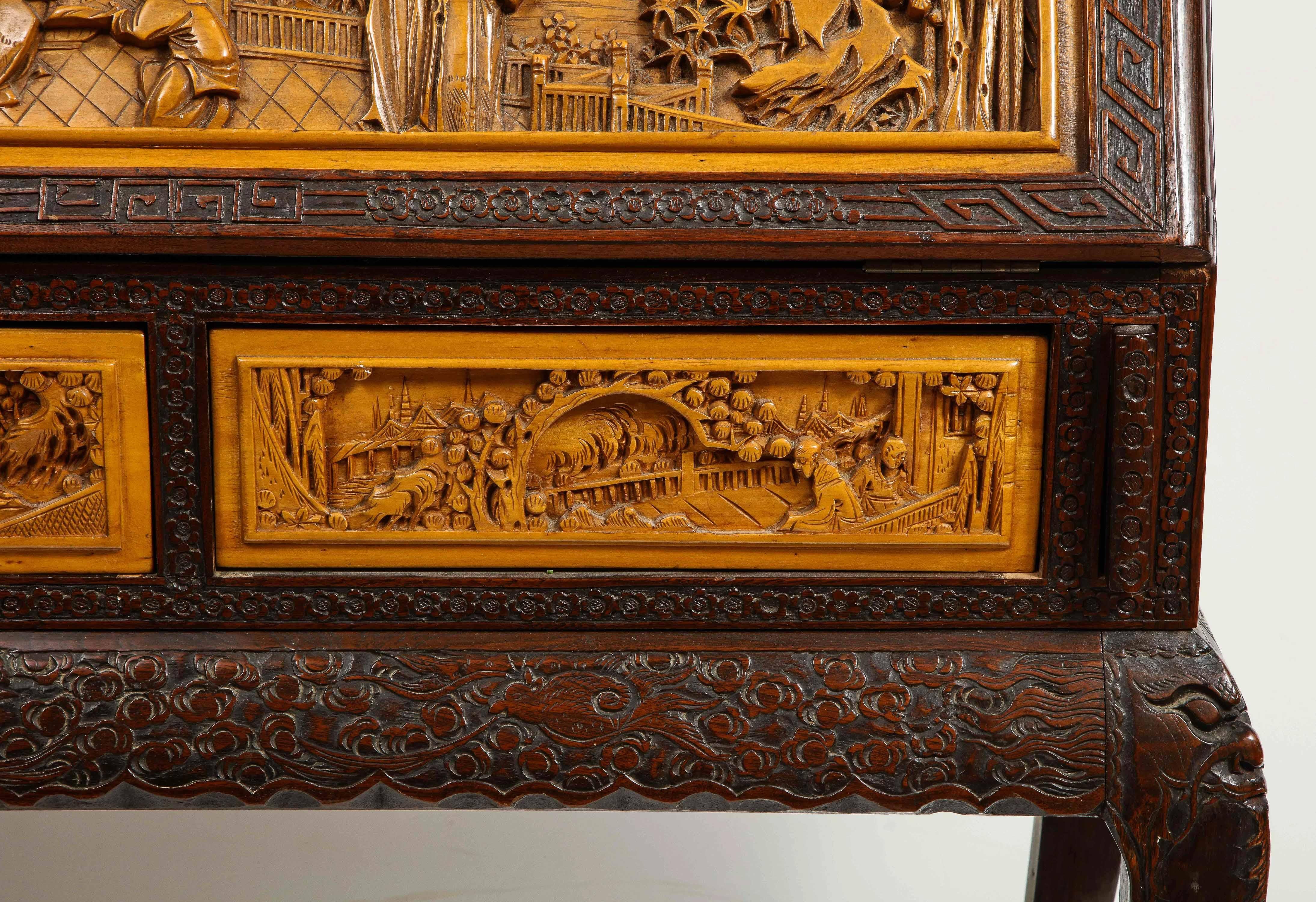 Hardwood Chinese Export Carved Figural Hard Wood Desk Cabinet, circa 1900s
