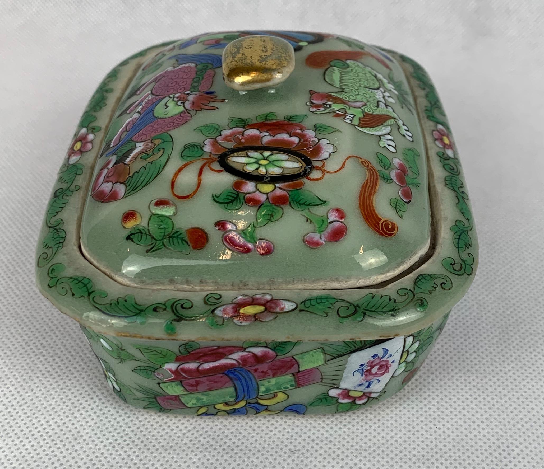 Chinese Export celadon porcelain three part soap dish. The piece commonly missing is the middle insert or drain, however, in this case it is complete. The soap dish is hand painted in bright and colorful hues showing mythological creatures, scrolls,