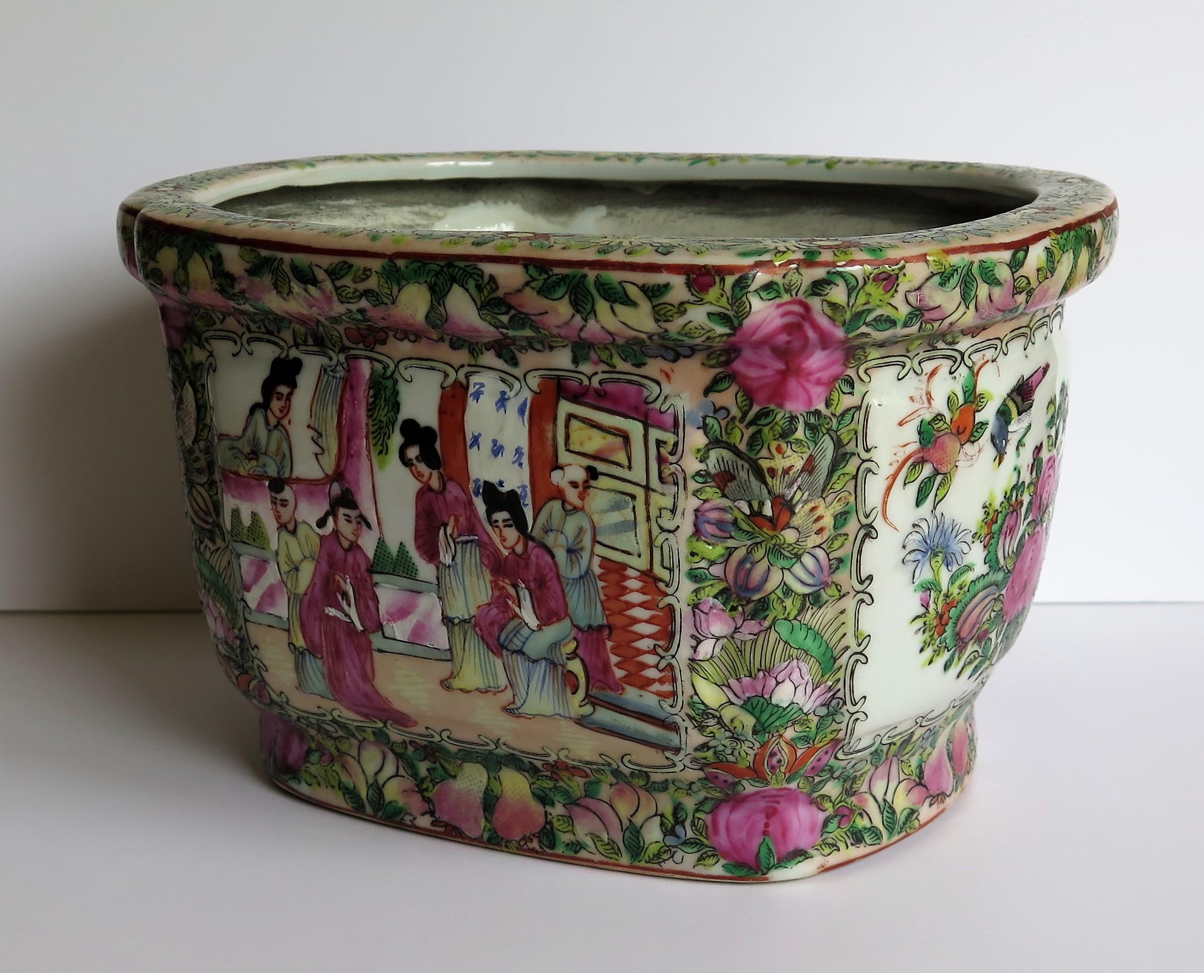 This is a very decorative ceramic Chinese export planter or jardinière in a rose medallion hand decorated pattern, dating to the late Qing period, circa 1900.

This piece is of a good useful size and has a lovely rectangular-oval shape, which is
