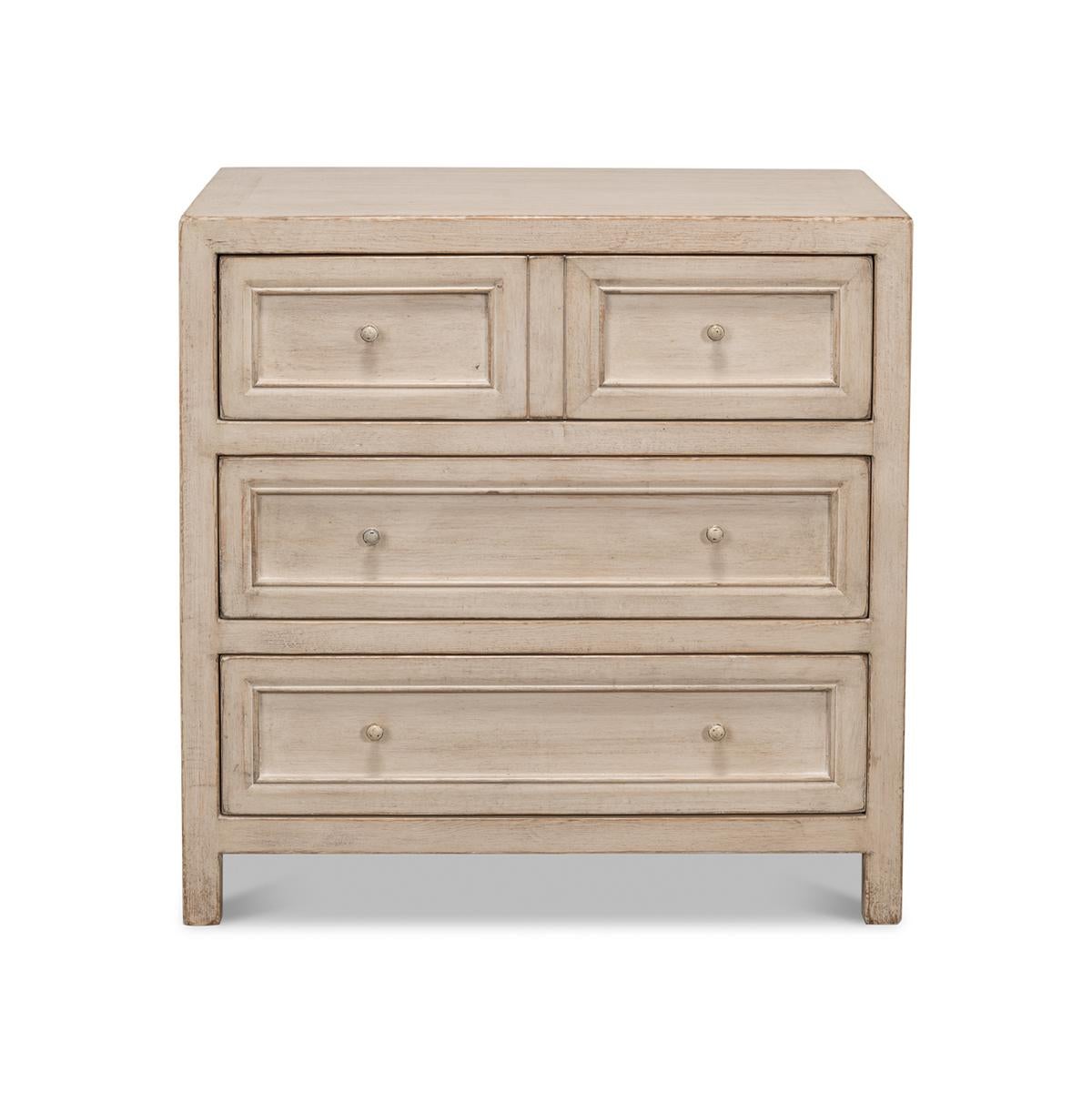 Meticulously crafted with a distressed stone grey finish, this chest exudes an authentic vintage Chinese export feel that resonates with the warmth of a cozy country cottage.

The chest features a trio of spacious drawers, each adorned with classic