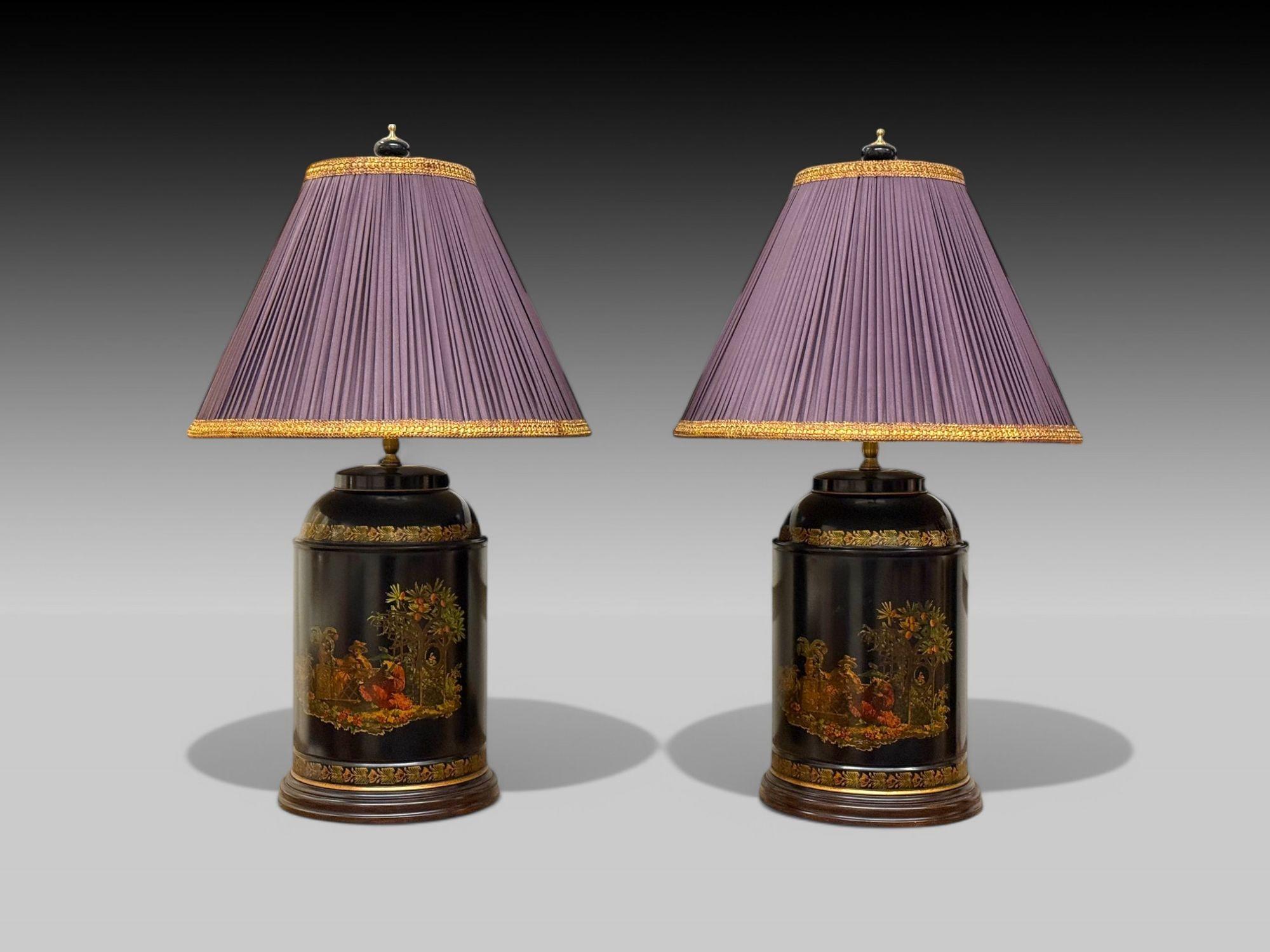 Chinese Export, Chinoiserie, Black Metal, Canister Table or Desk Lamps, Silk Shades, 1960s

Pair of Black Canister Lamps with Custom plum-colored shades. The canisters feature two similar painted scenes of two neighbors visiting in a garden. The