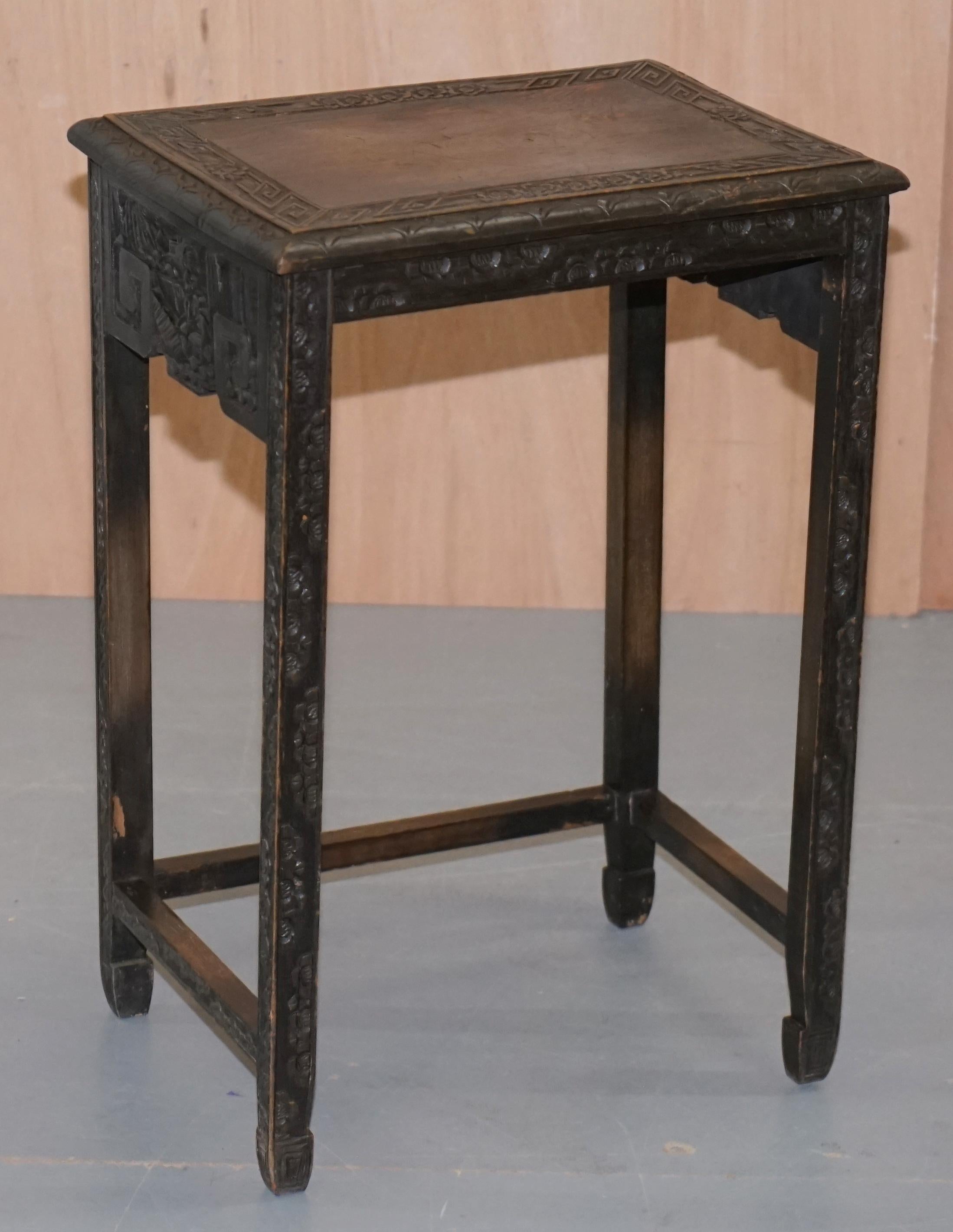 Early 20th Century Chinese Export circa 1900 Nest of Three Tables Heavily Carved All-Over Ebonized