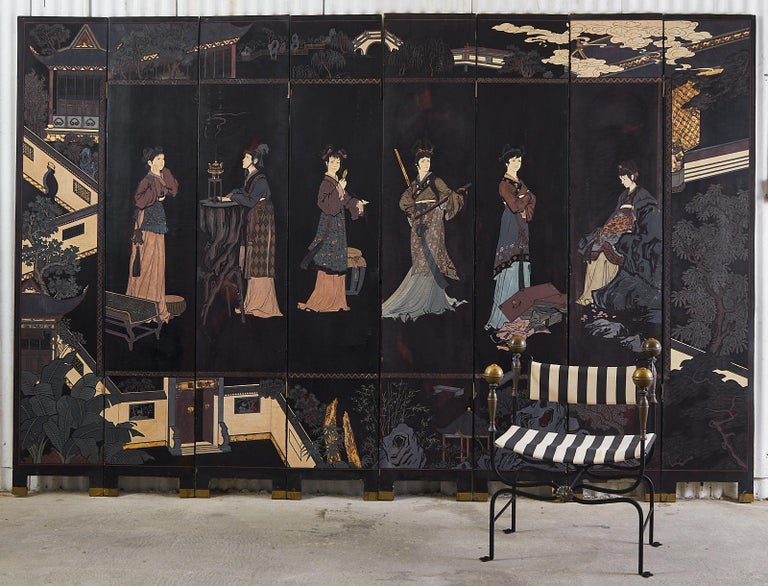 Rare and unusual Chinese export eight panel lacquered coromandel screen depicting six beauties. The scene is bordered by a walled pavilion with pagodas and trees. The women appear to be Western descent probably from a narrative tale. The reverse