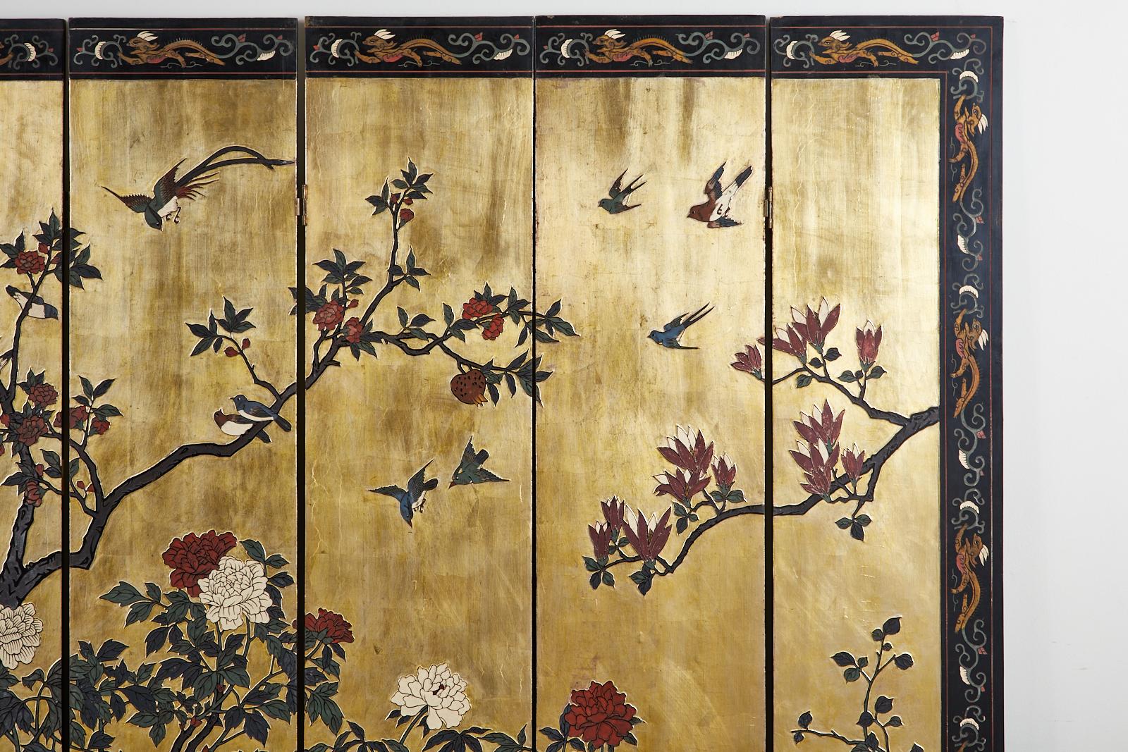 20th Century Chinese Export Eight Panel Gilt Lacquered Coromandel Screen