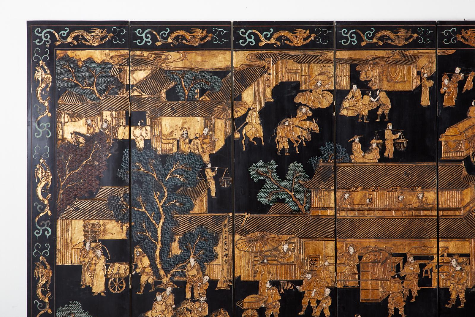 Chinese Export Eight-Panel Gilt Lacquered Coromandel Screen 1