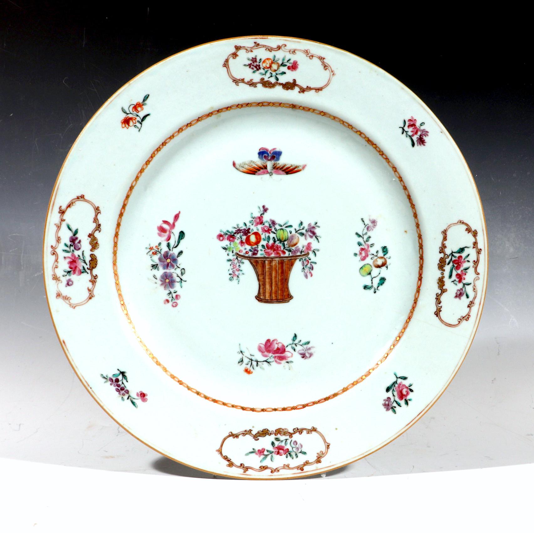 Chinese Export Famille rose porcelain dish with flower basket & butterfly,
circa 1765

The Chinese Export famille rose porcelain dish is painted in enamels with a central wicker flower basket overflowing with fruit and flowers and above is a