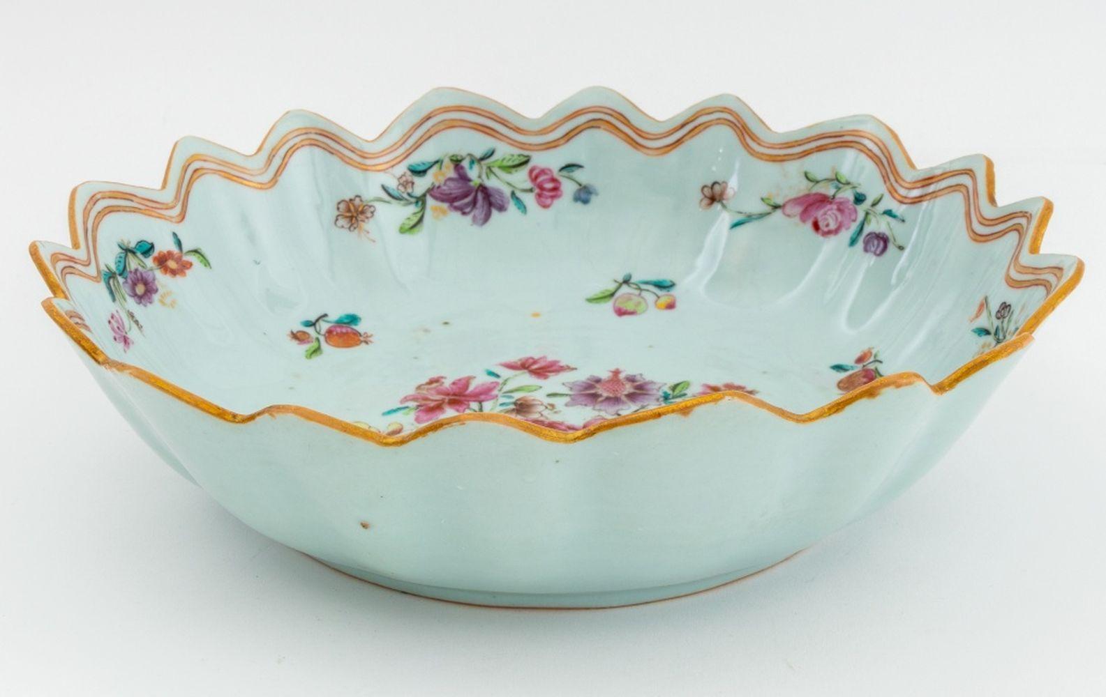 Chinese Export Famille Rose Porcelain Lobed Bowl, Qianlong Period, circa 1760, with hand-painted floral and fruit motif and label to underside. 10.25
