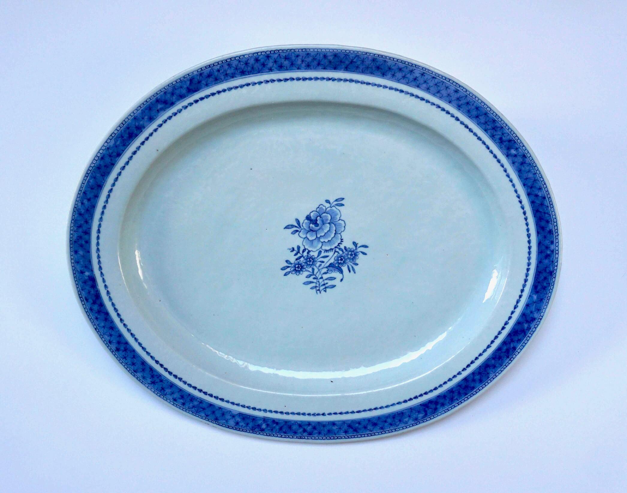 A rare circa 1790 Chinese export for the Swedish Gustavian period market porcelain platter of large oval form having underglaze blue 'Canton' compound border of pearls surrounding trellis with stars, and unique inner border of neoclassical