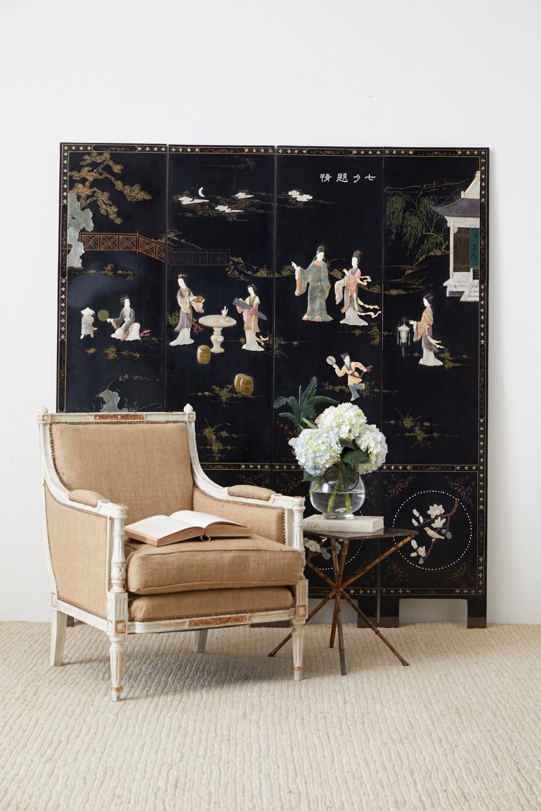 Impressive Chinese export coromandel style four panel screen featuring hand-carved soapstone beauties in a pagoda landscape. The bottom of the screen has round windows decorated with carved flora and fauna scenes. The entire front is bordered with
