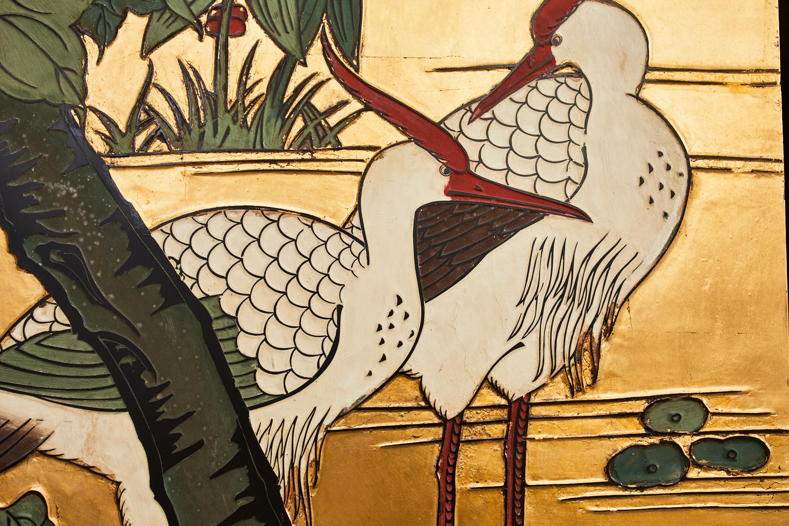 20th Century Chinese Export Four Panel Coromandel Screen Cranes on Gold Leaf For Sale